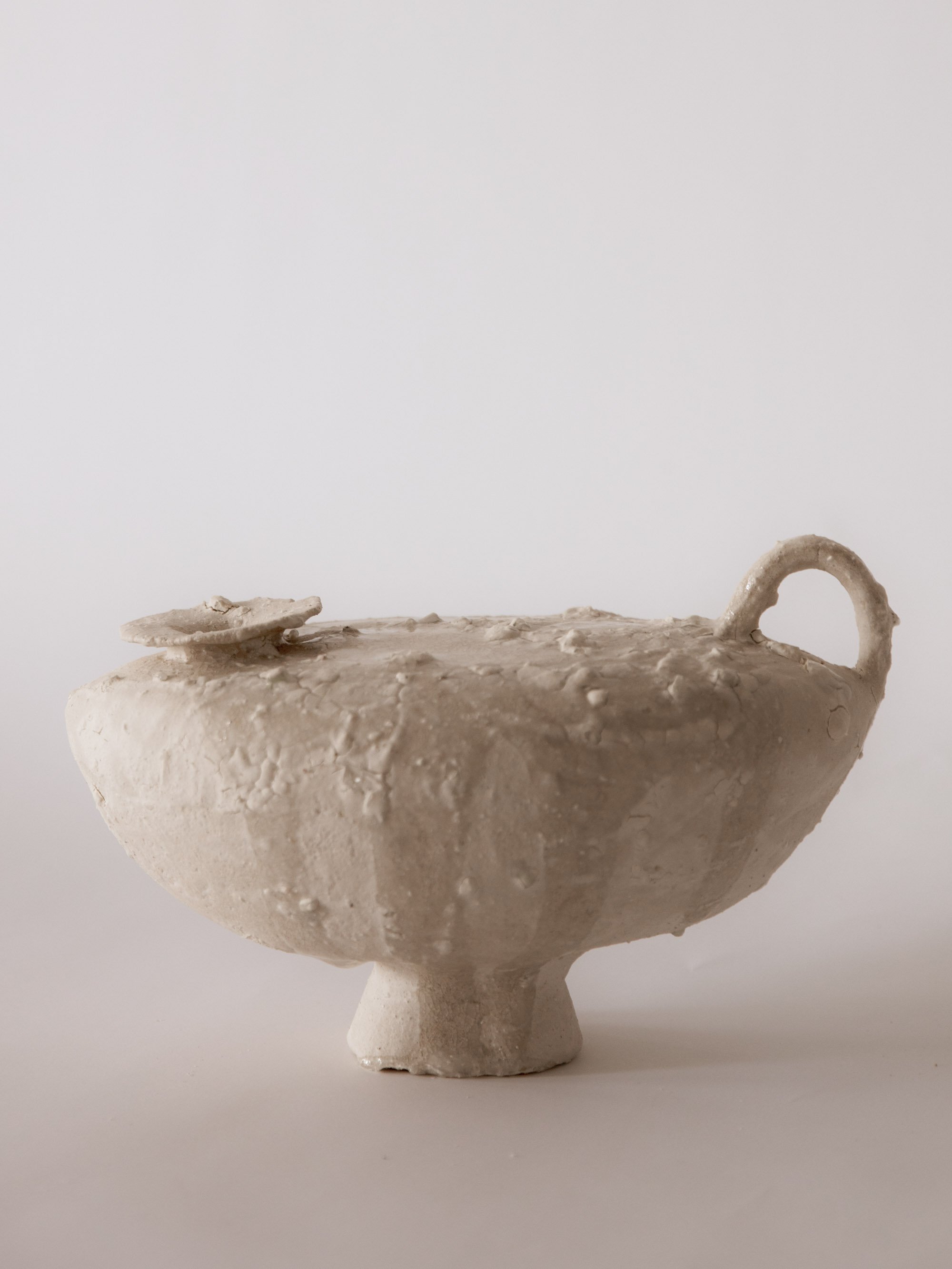 Sculpture clay, porcelain slip, clear glaze, recycled glass 5"H x 6"W x 10"L, 2023 /