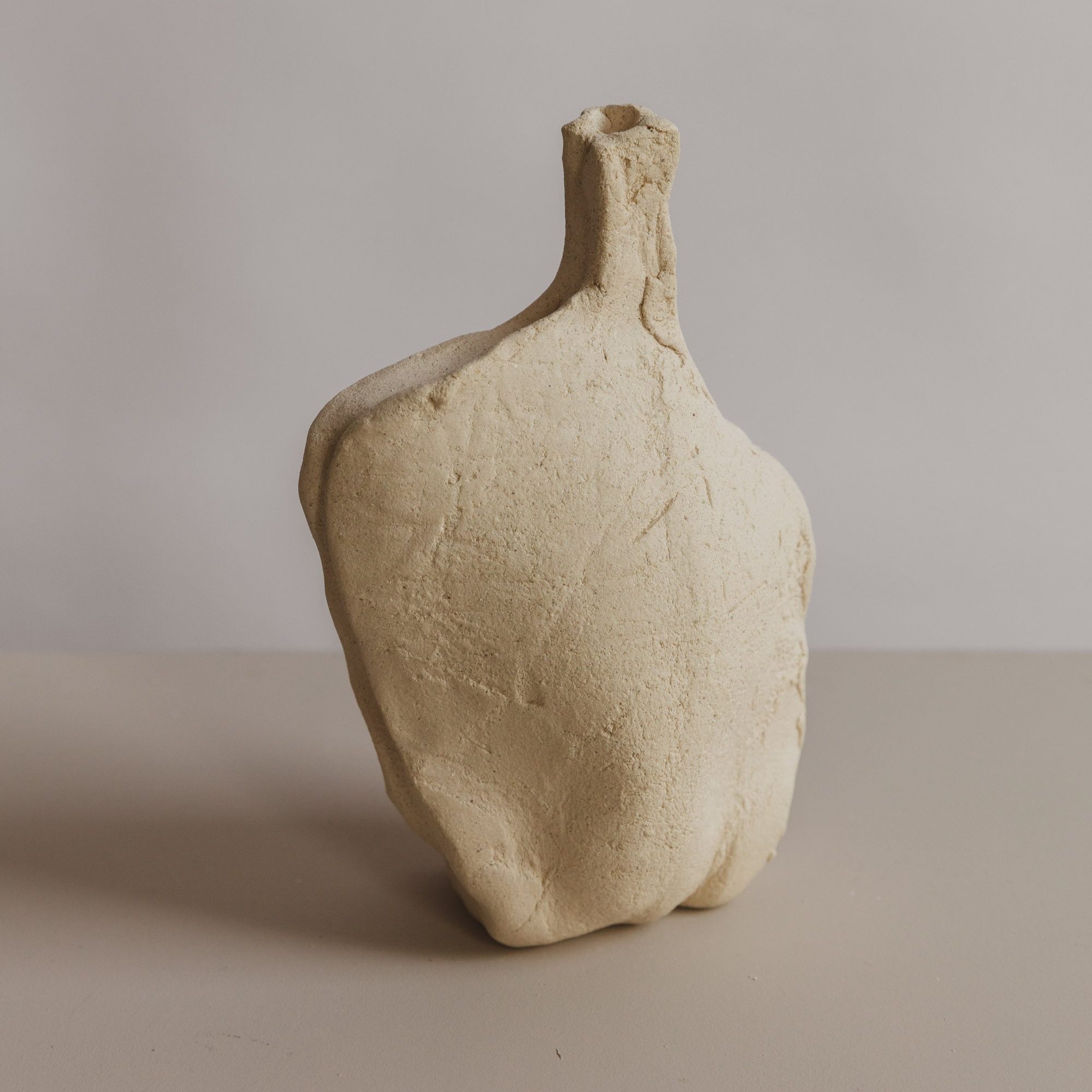 #37 Sculptural bottle No. 5, 2025, 7"H x 5"L x 2"W, sculpture clay.