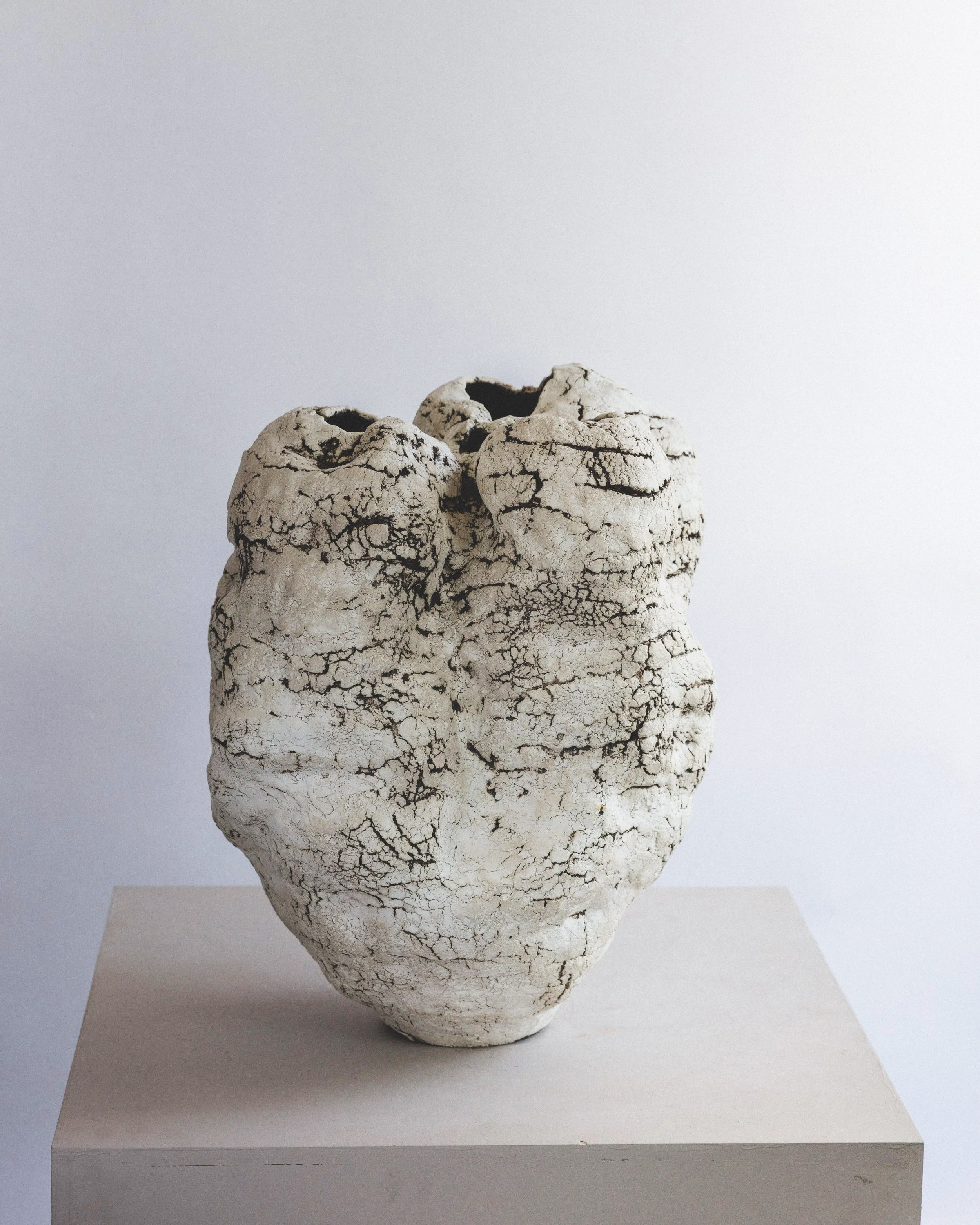#03 🟡 Limitless Boundaries No. 2, 2025, 17.5 "H x 14" D Sculpture clay, terra sigillata, metallic glaze. $10,000