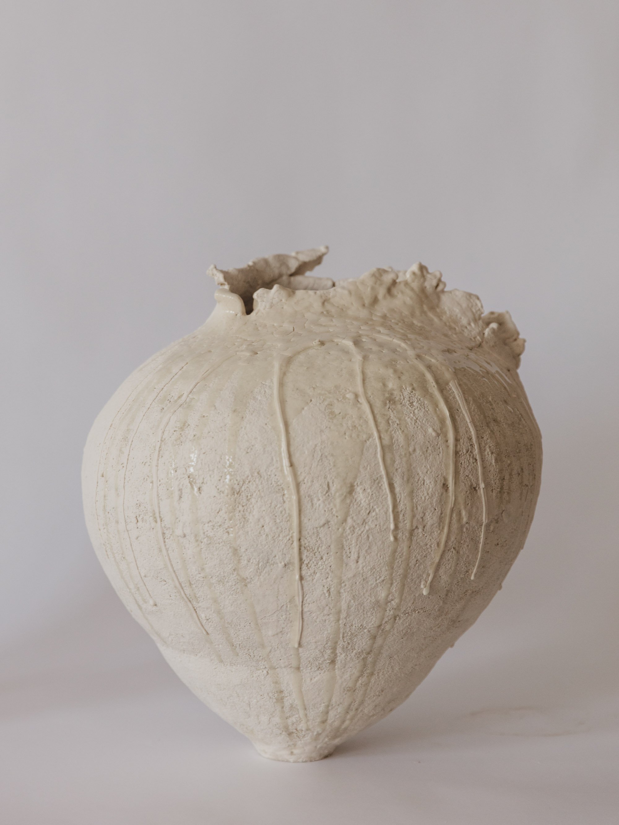 Sculpture clay, porcelain slip, clear glaze 16"H x 14"D, 2023