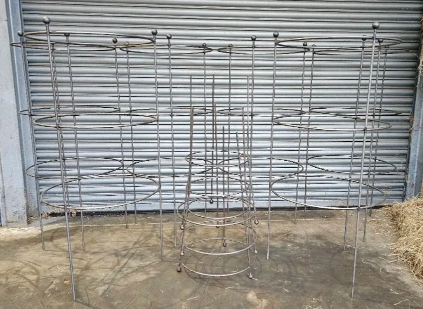 Hand made steel plant supports