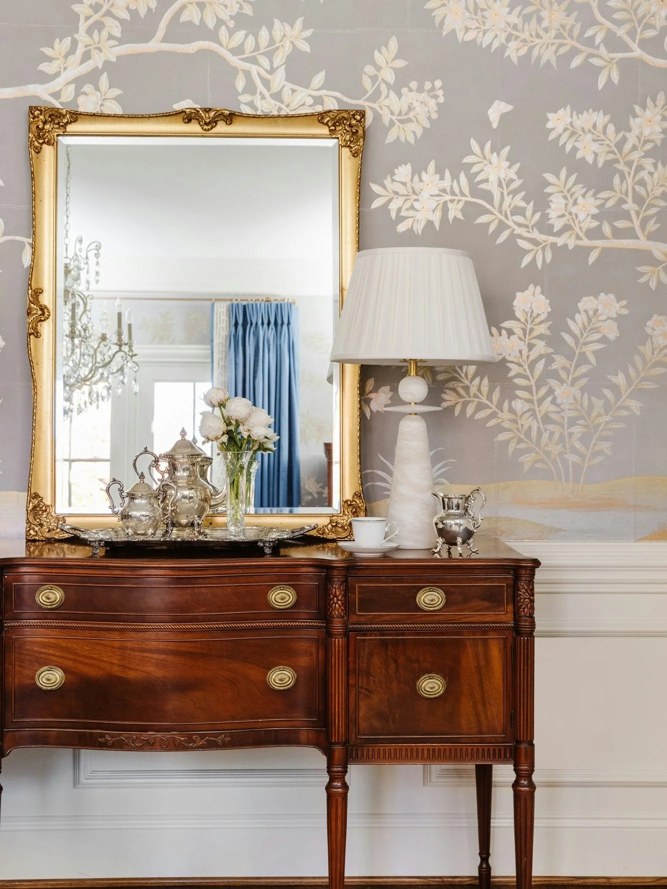 So much heart and elegance in this room that is centered around two cherished family heirlooms: the gorgeous antique sideboard and the beautifully-preserved piano. The warmth and history of these pieces add unparalleled character and personal charm. 