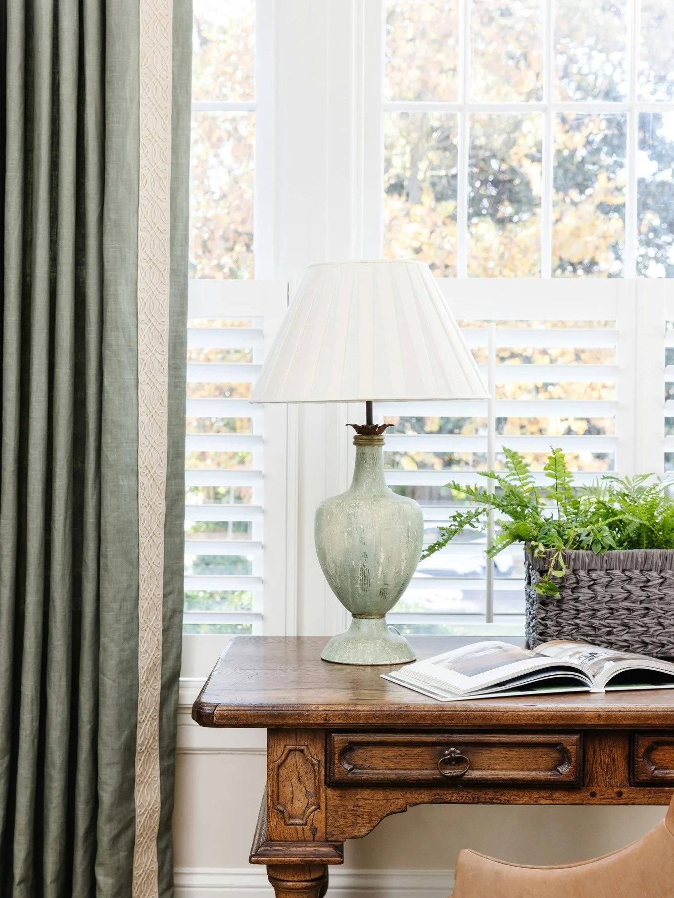 An antique desk framed by custom drapery and natural light. Designed as a quiet place to sit, read, or take a moment during the day.

#LuxuryInteriorDesign #ClassicInteriors #TraditionalDesign #DesignInspiration #TimelessHome #CarolineBrackettDesign