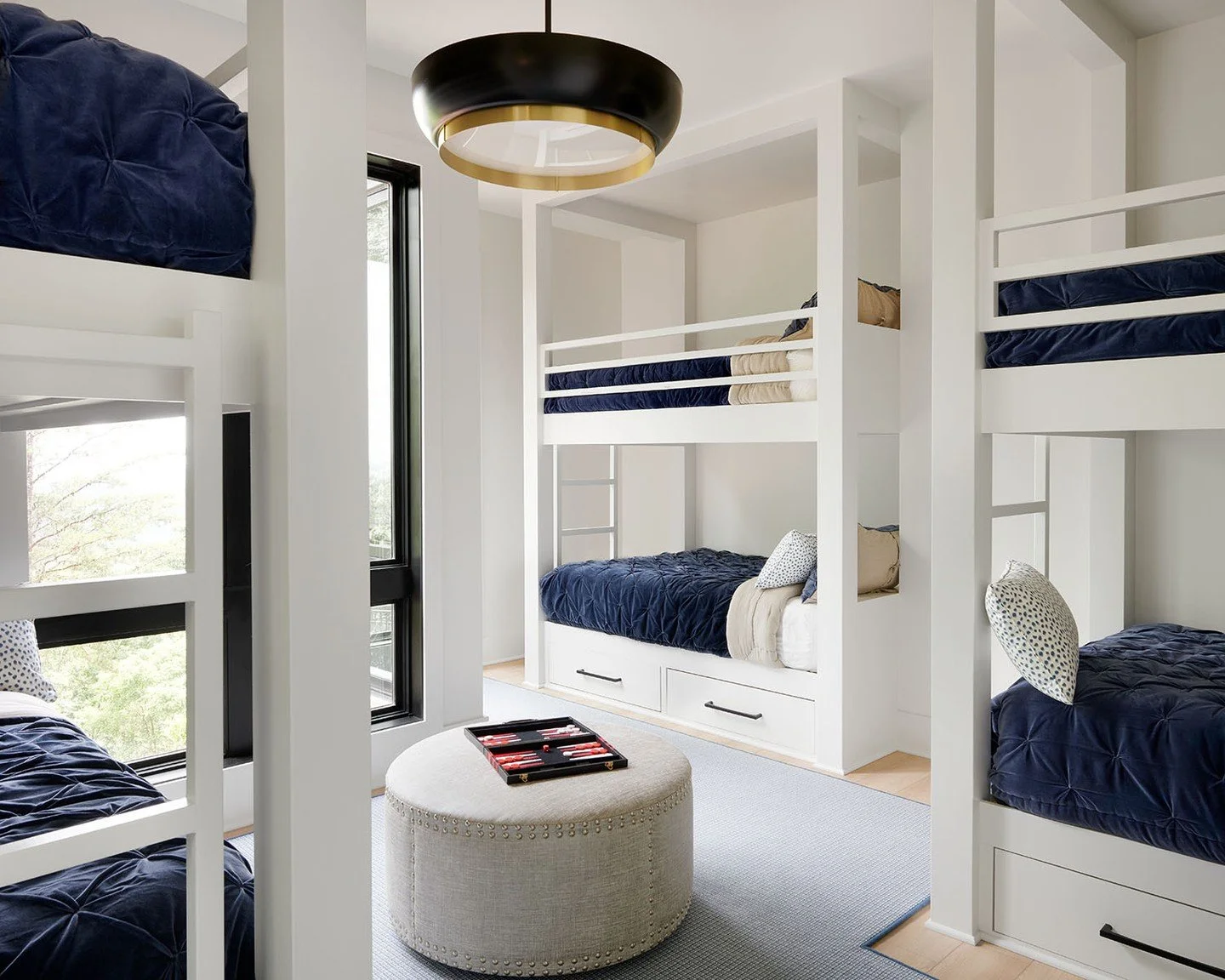 From one bedroom to the next, the experience changes. The bunk room invites piling in and staying up late, the primary unwinding on your own.

Architecture: @designelitesc
Builder: @evergreencustomconstruction
Photographer: @alisongootee

#LuxuryInte