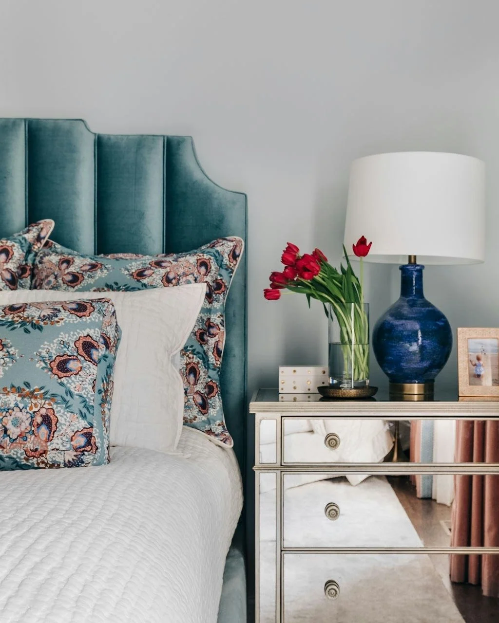 It&rsquo;s all in the mix. Anchored by a custom channel-tufted velvet bed, we blended bold colors, patterns, and metallic accents to keep the space feeling textured, cohesive, and deeply inviting. ✨🩵

#LuxuryBedroom #VelvetUpholsteredBed #DreamBedro
