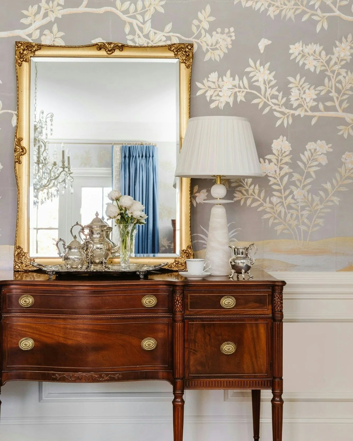 So much heart and elegance in this room that is centered around two cherished family heirlooms: the gorgeous antique sideboard and the beautifully-preserved piano. The warmth and history of these pieces add unparalleled character and personal charm. 