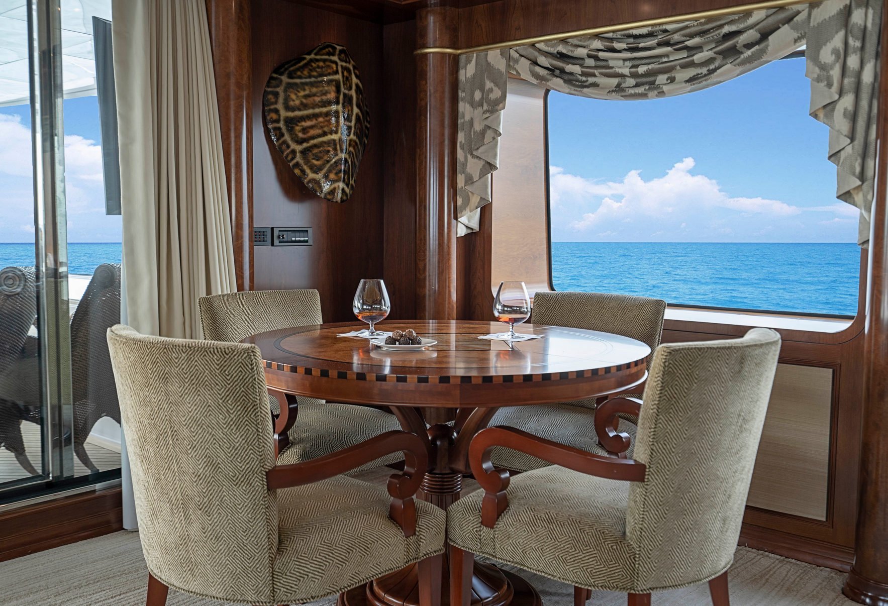 luxury-charter-yacht-aqausition-skyllounge-table (1).jpg