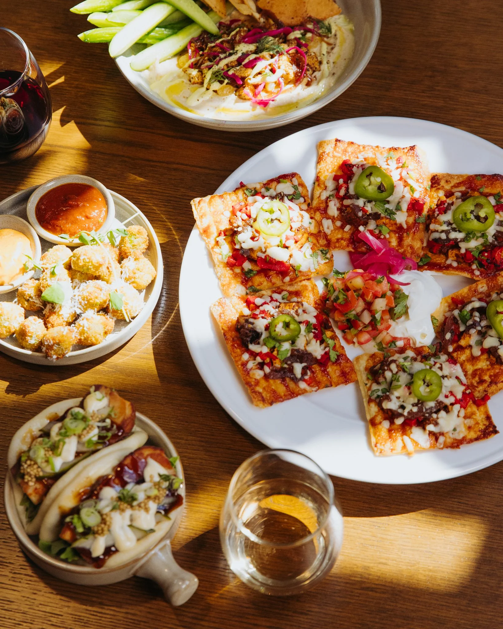 cauliflower hummus - steam buns - olives - nachos-2.jpg