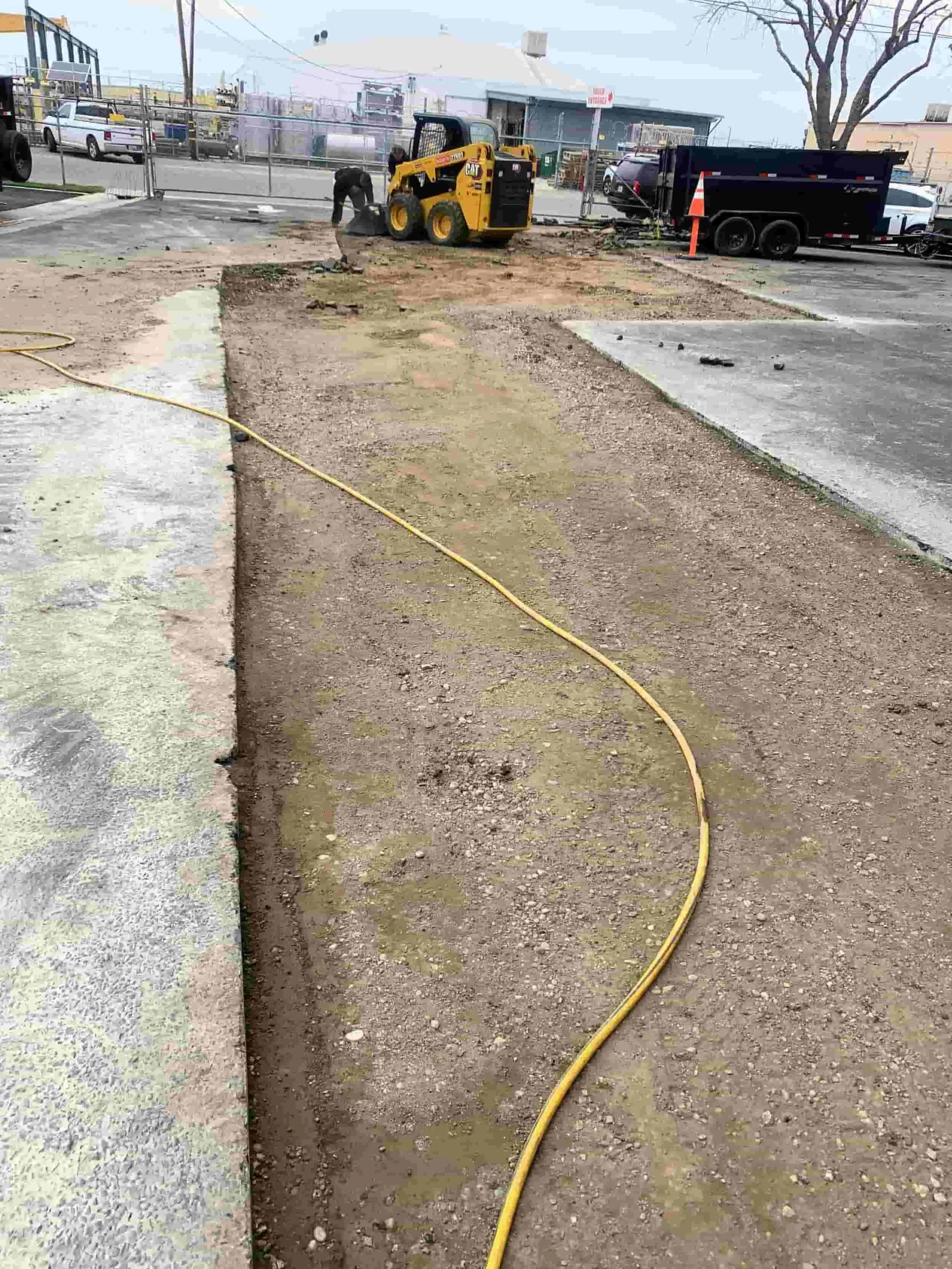 Asphalt has been cut and removed, The base has been properly compacted and ready for new asphalt patch