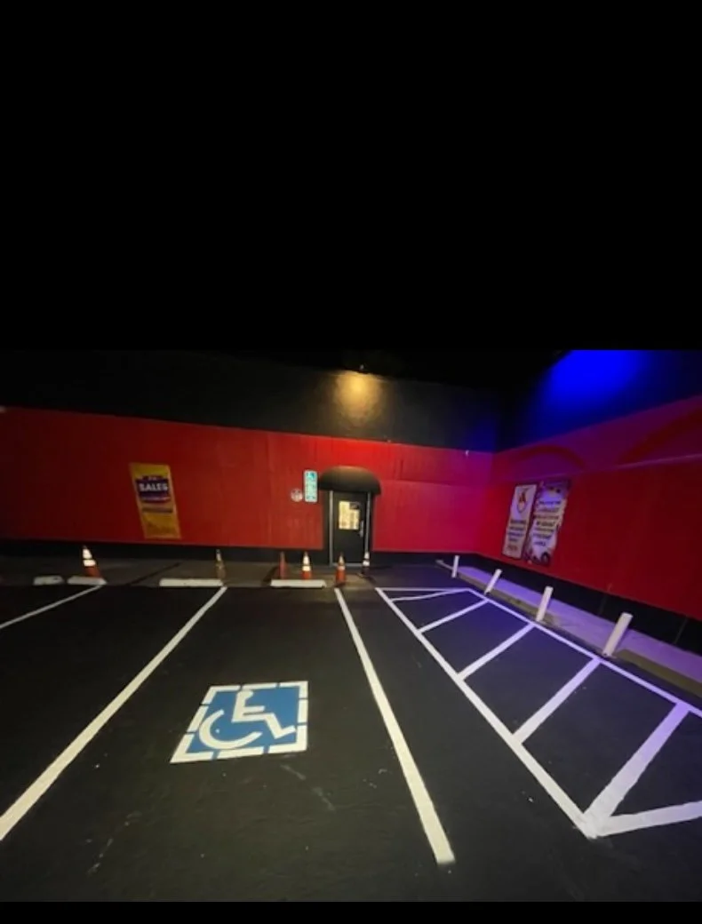 Empty parking lot with freshly painted parking space lines, 