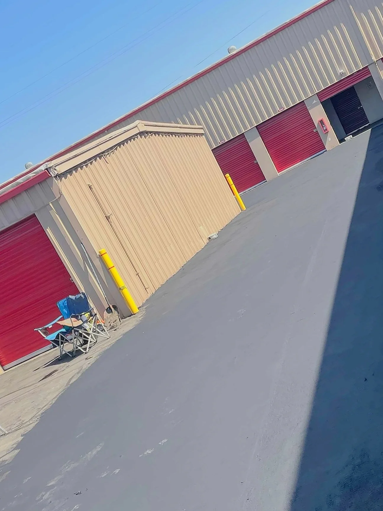 asphalt that is freshly paved inside a storage rental property