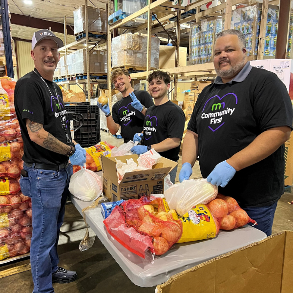 Food Bank volunteers packing bags