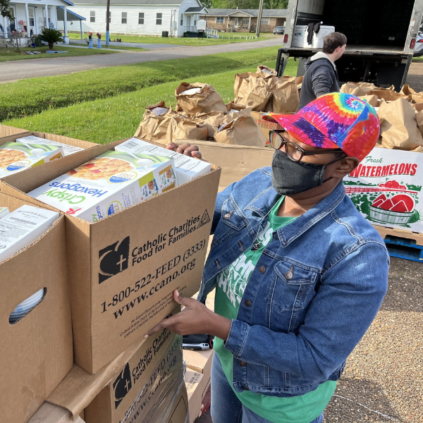 Food Bank volunteer packing boxes