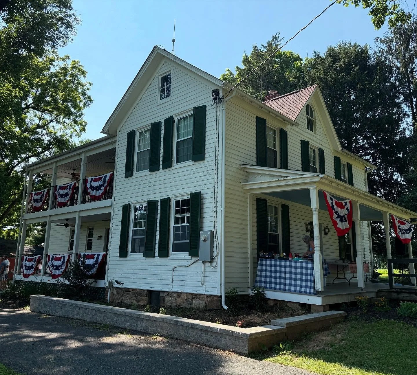 Happy 4th! - A 120+ year old farmhouse home we designed a complete interior renovation and addition for from a few years ago all decked out for the holiday. Our scope of work included modernizing the interior, adding a new owners suite, moving the la