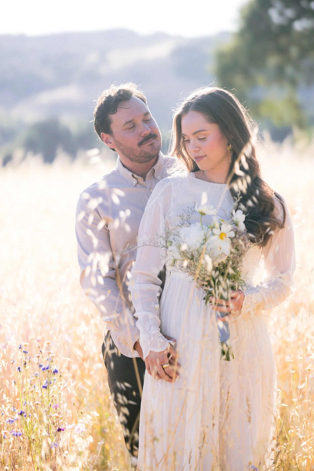 Intimate Paso Robles elopement ceremony beneath ancient oak trees on a private lavender farm