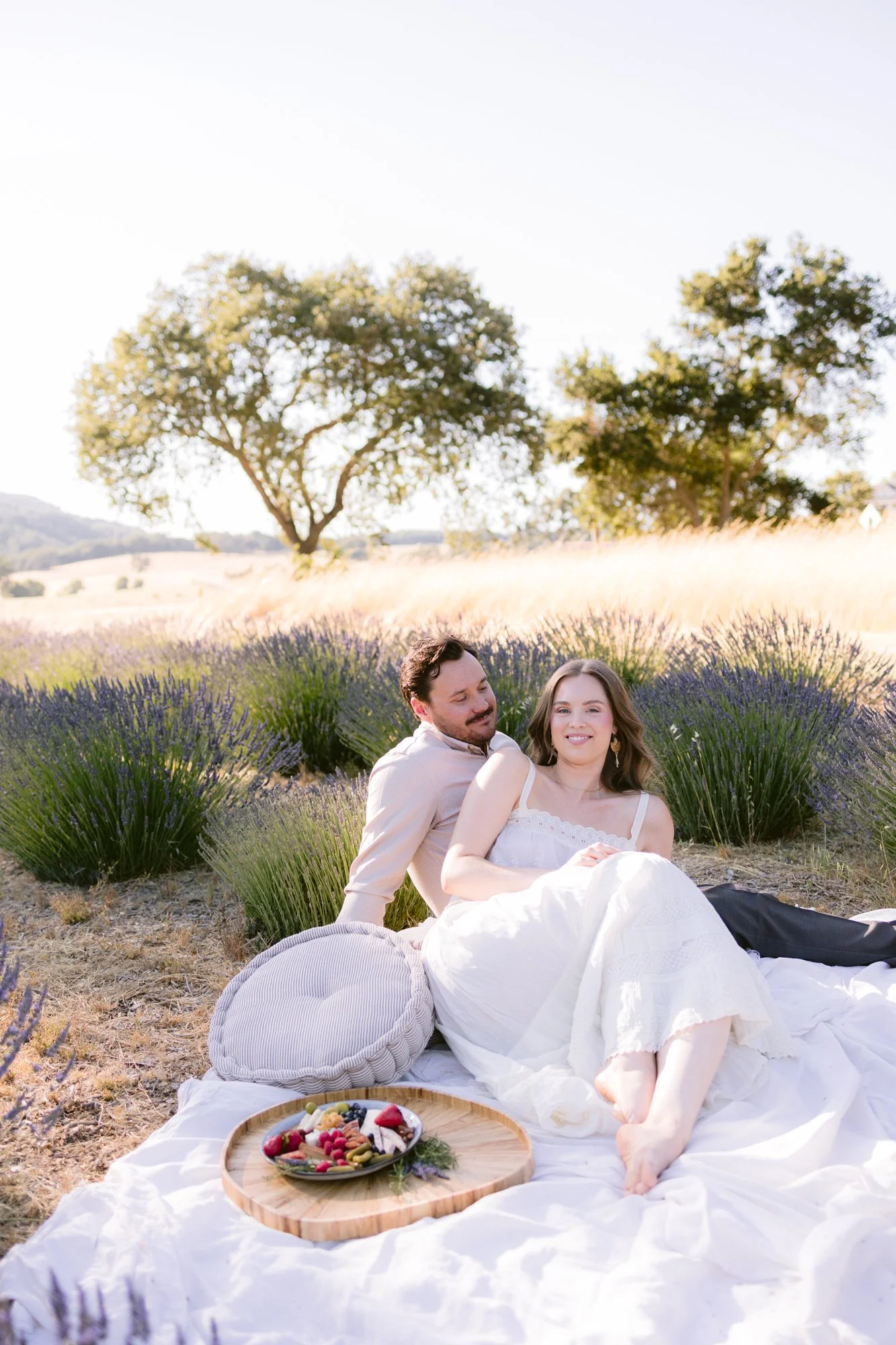 Just-married moment in blooming wildflowers on the Central Coast