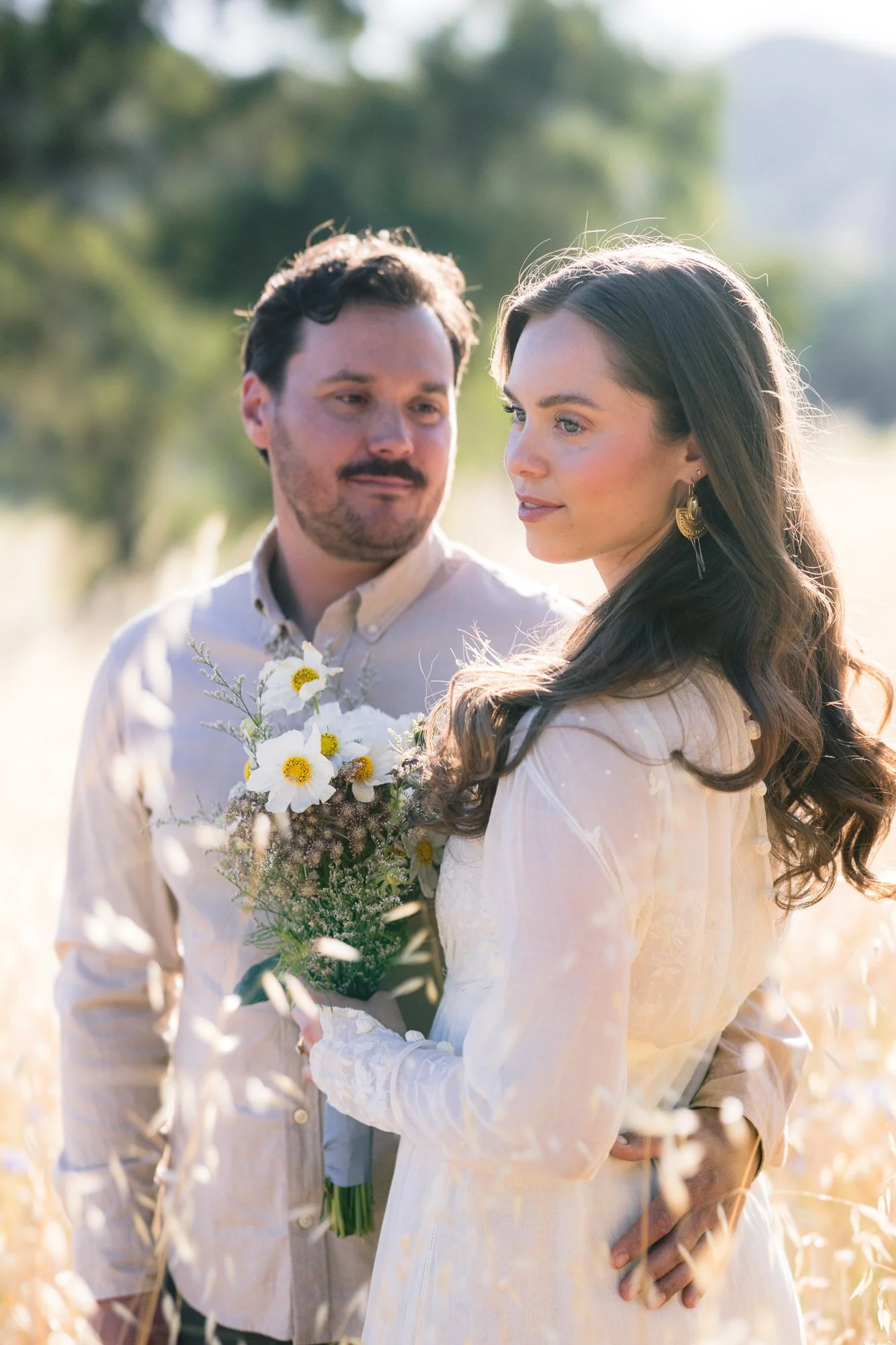 Intimate Paso Robles elopement ceremony beneath ancient oak trees on a private lavender farm