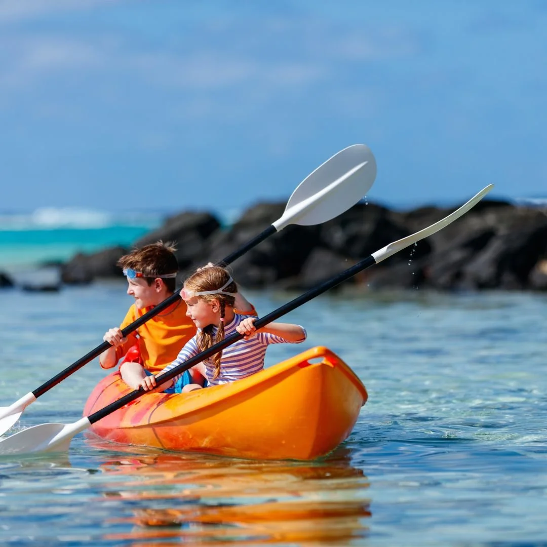 Young Children Canoeing 