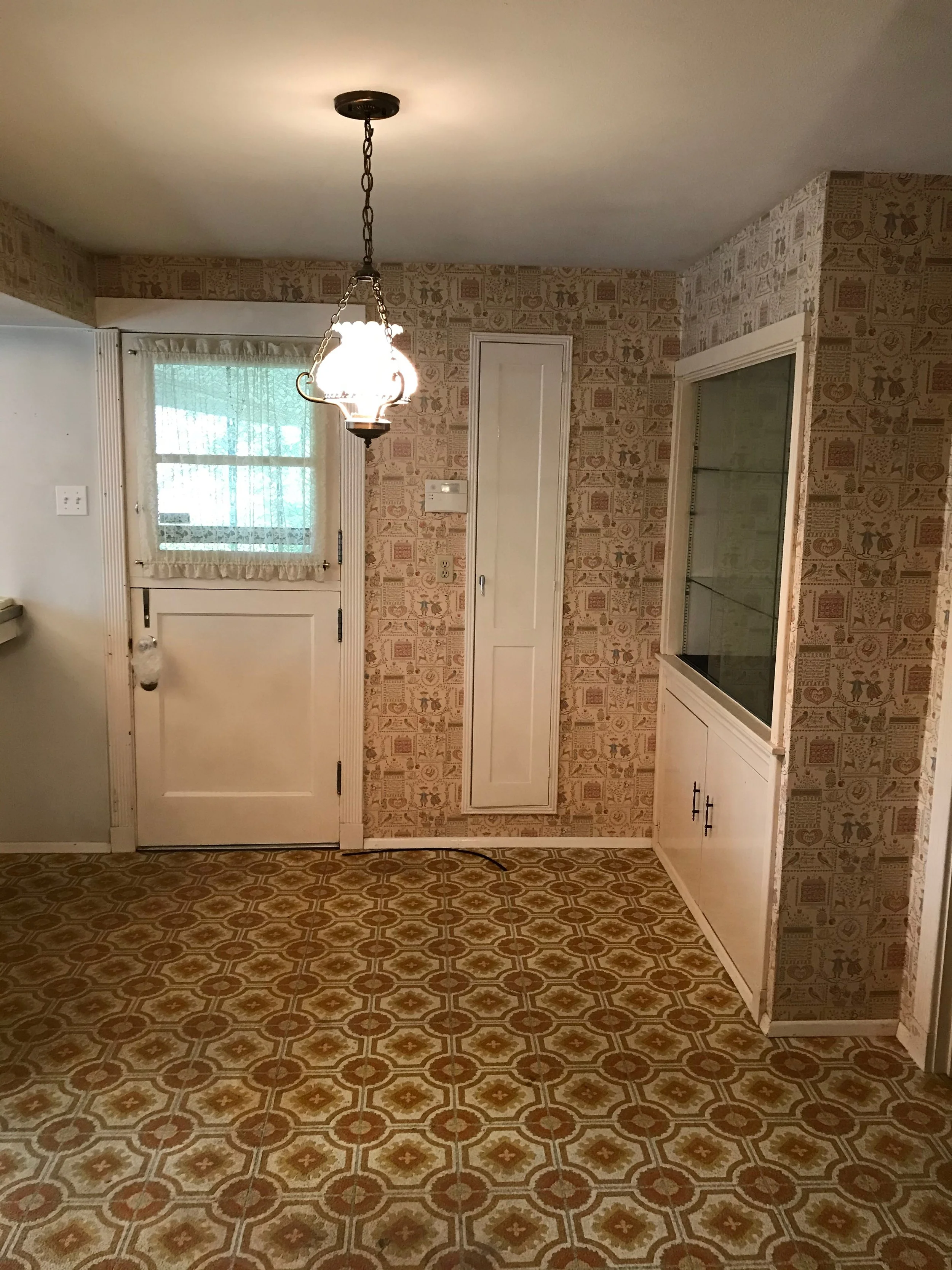 Before - Dutch door and wall into dining room