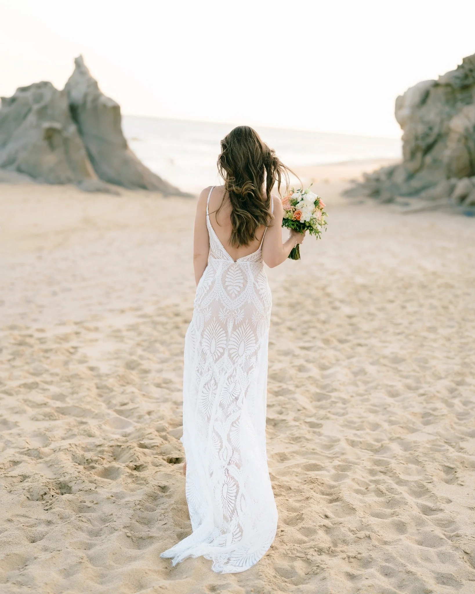 The Pacific breeze carries promises born by the sea. In the golden light, with waves whispering in the distance, time stands still to hold this moment forever.

.

.

.

.

.

#LosCabosWeddingPhotographer #CaboWeddingPhotographer #FineArtWeddingPhoto