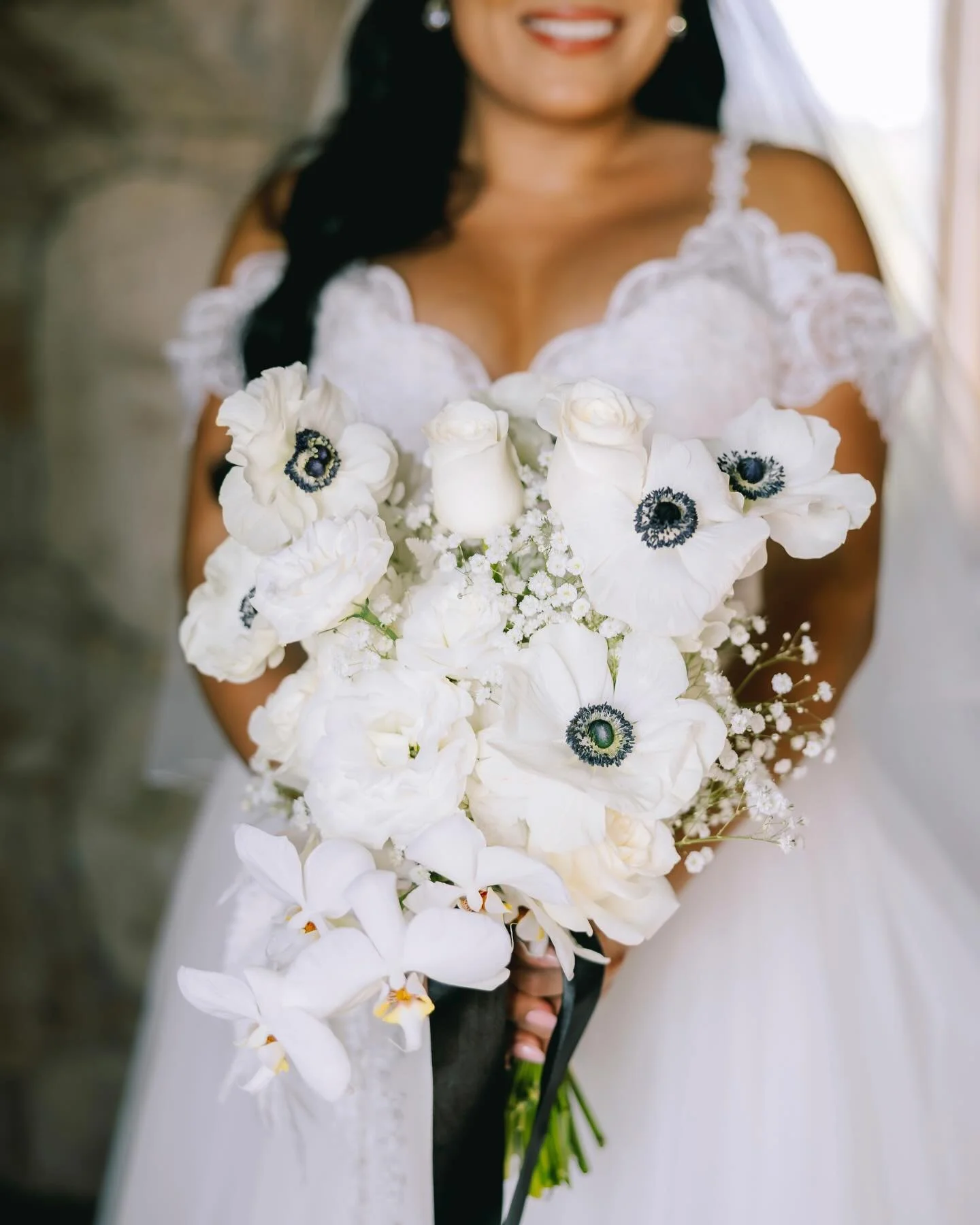 A celebration shaped by stillness and intention, where white florals were held with quiet grace and the stone walls of Rancho Shibumi carried the weight of time and memory. The light moved slowly across the space, allowing every detail to breathe &md