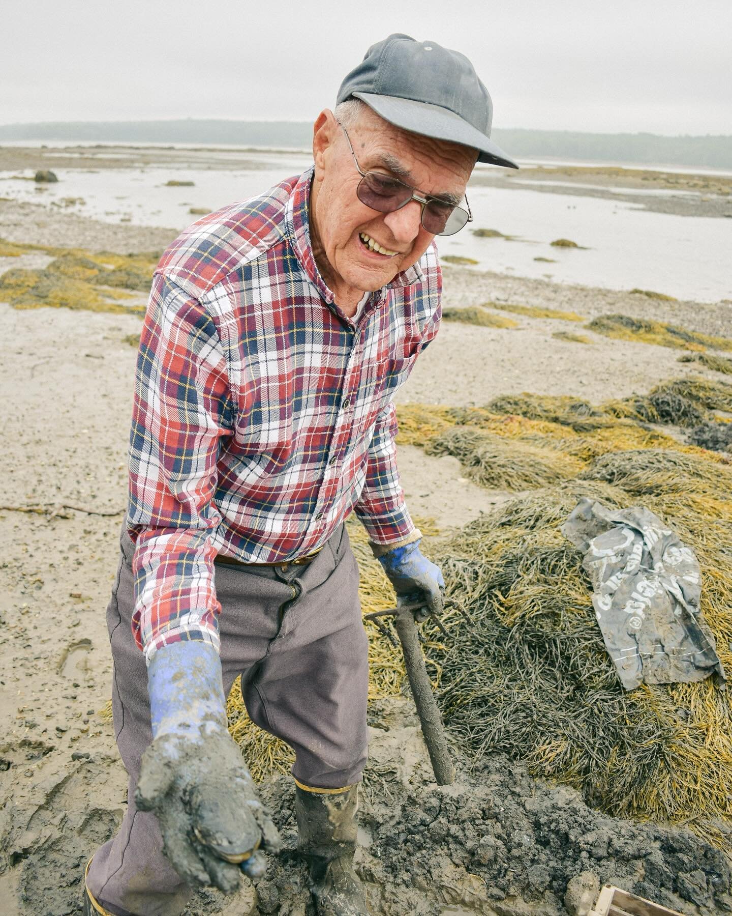 Took a trip through my photo archive recently in search of a specific photo. Of course, that led me on several side quests down memory lane. One of those side quests brought me to the clam flats Downeast with my brother and grandfather. Some of my fa