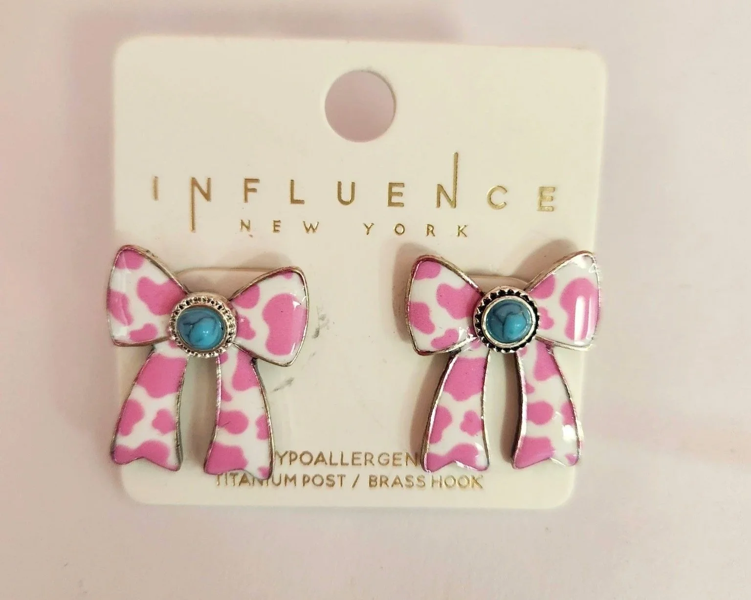 jewelry+pink+cow+print+bow+earrings.jpg