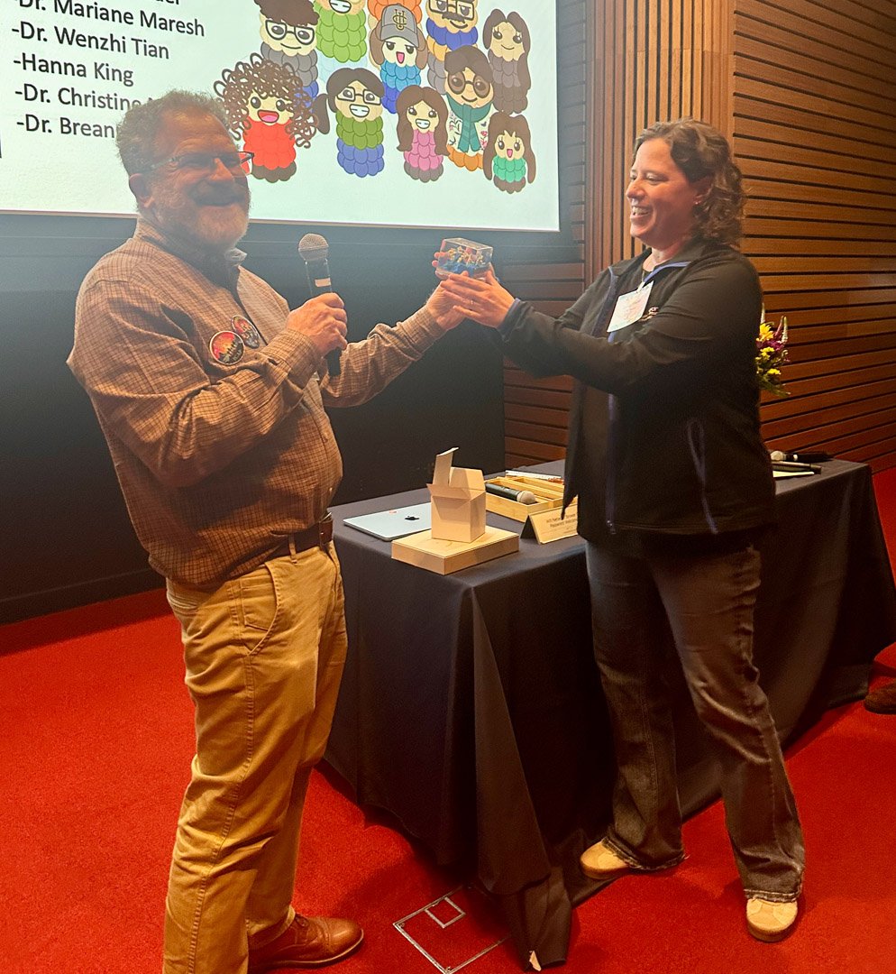 Darci Trader, UC Irvine, receiving her Summit Award