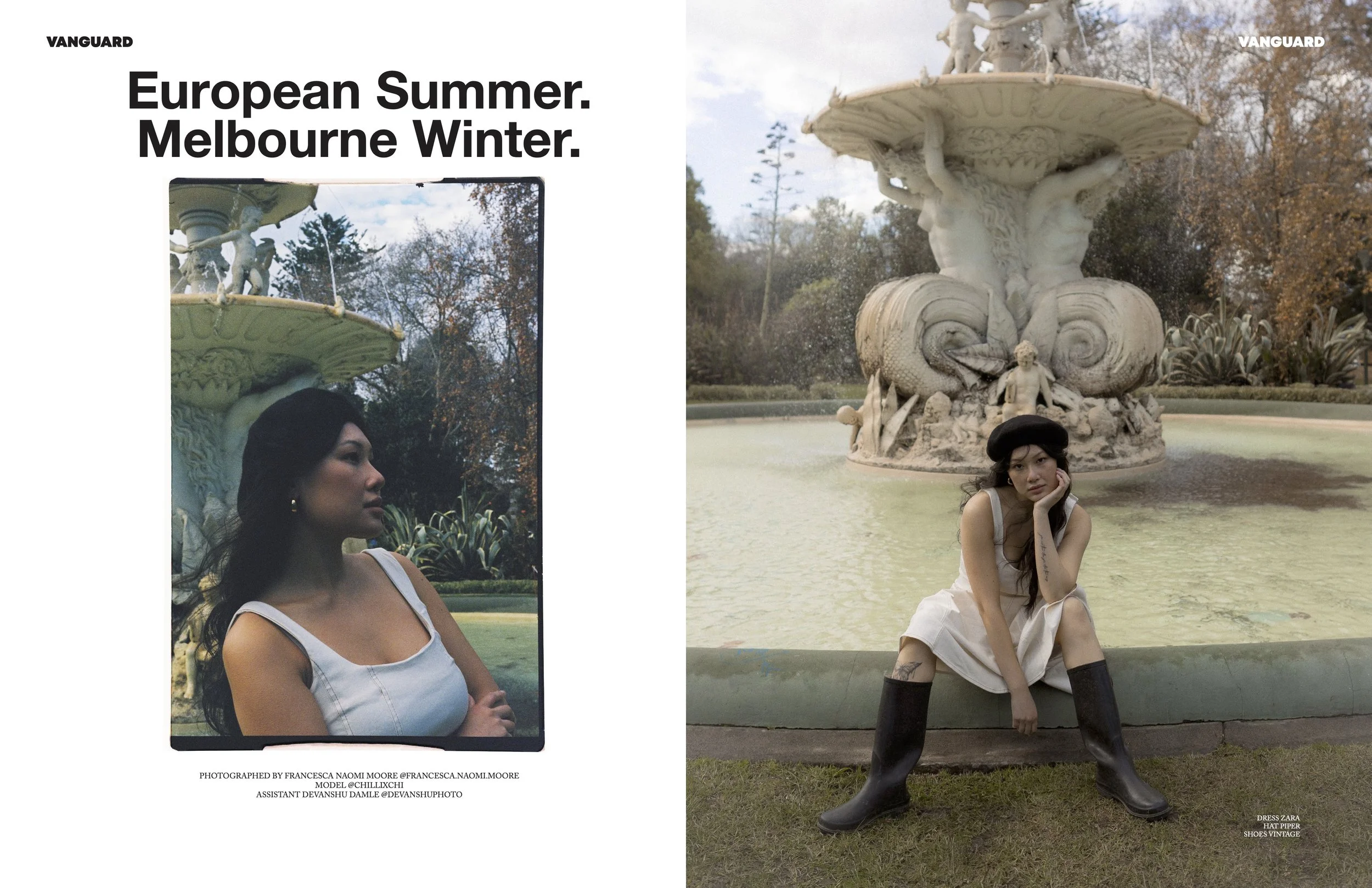 A woman in a white dress and black boots sitting by a fountain in a park in Melbourne, Australia, with trees in autumn colors in the background.