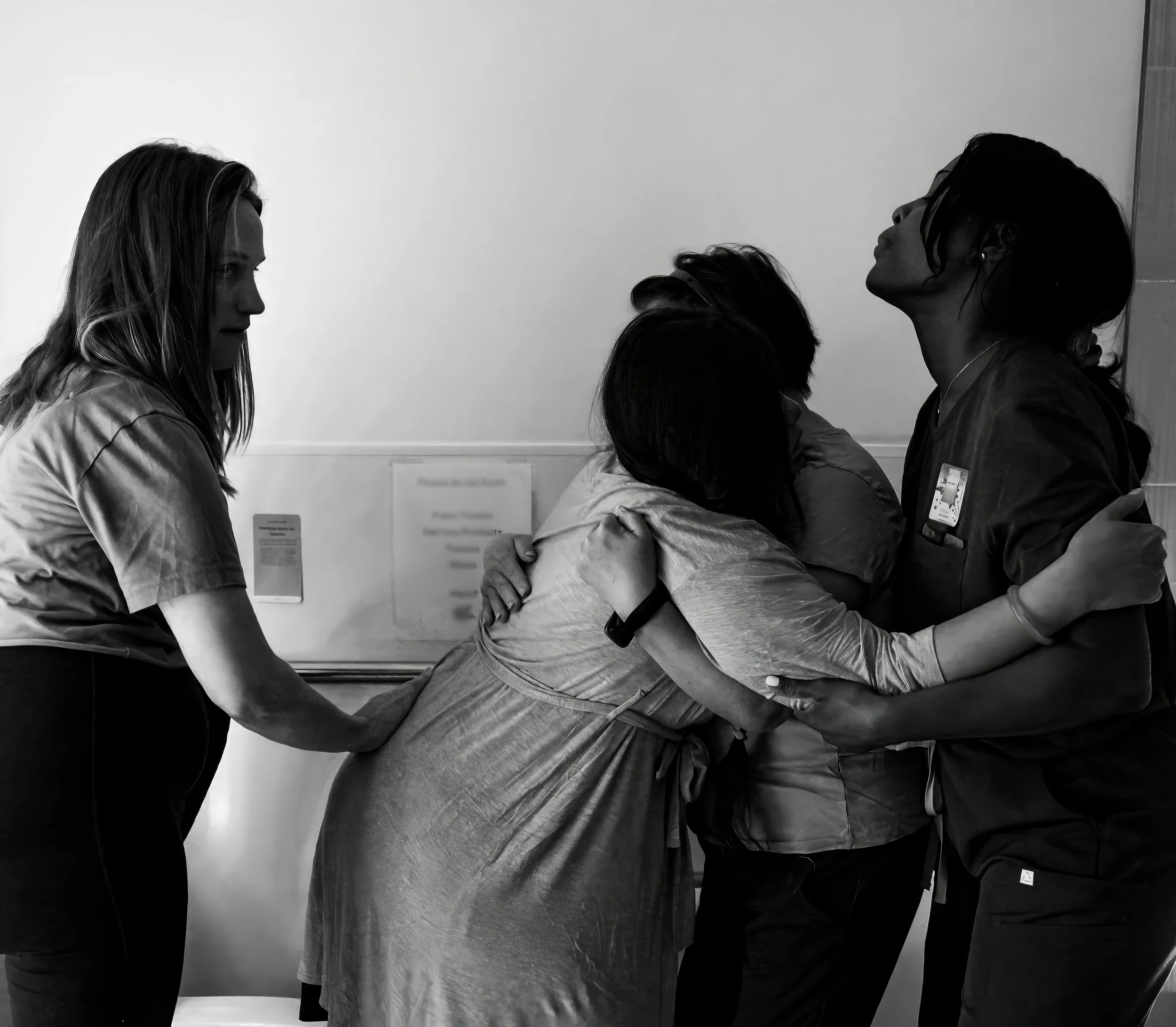 What it looks like when you are held, seen and supported during the most vulnerable time of labor. Right before you get to meet your baby you are surrounded and held by your midwife, doula and mother.

These are moments that you "might" rem