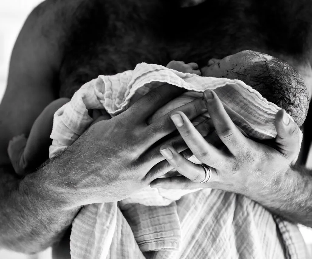 One brand-new life. 

The hands that built a home &mdash; that held each other through every long month &mdash; are the same ones now wrapped around the daughter they made.

He pulled her to his chest. She kept her hand over his. And just like that, 