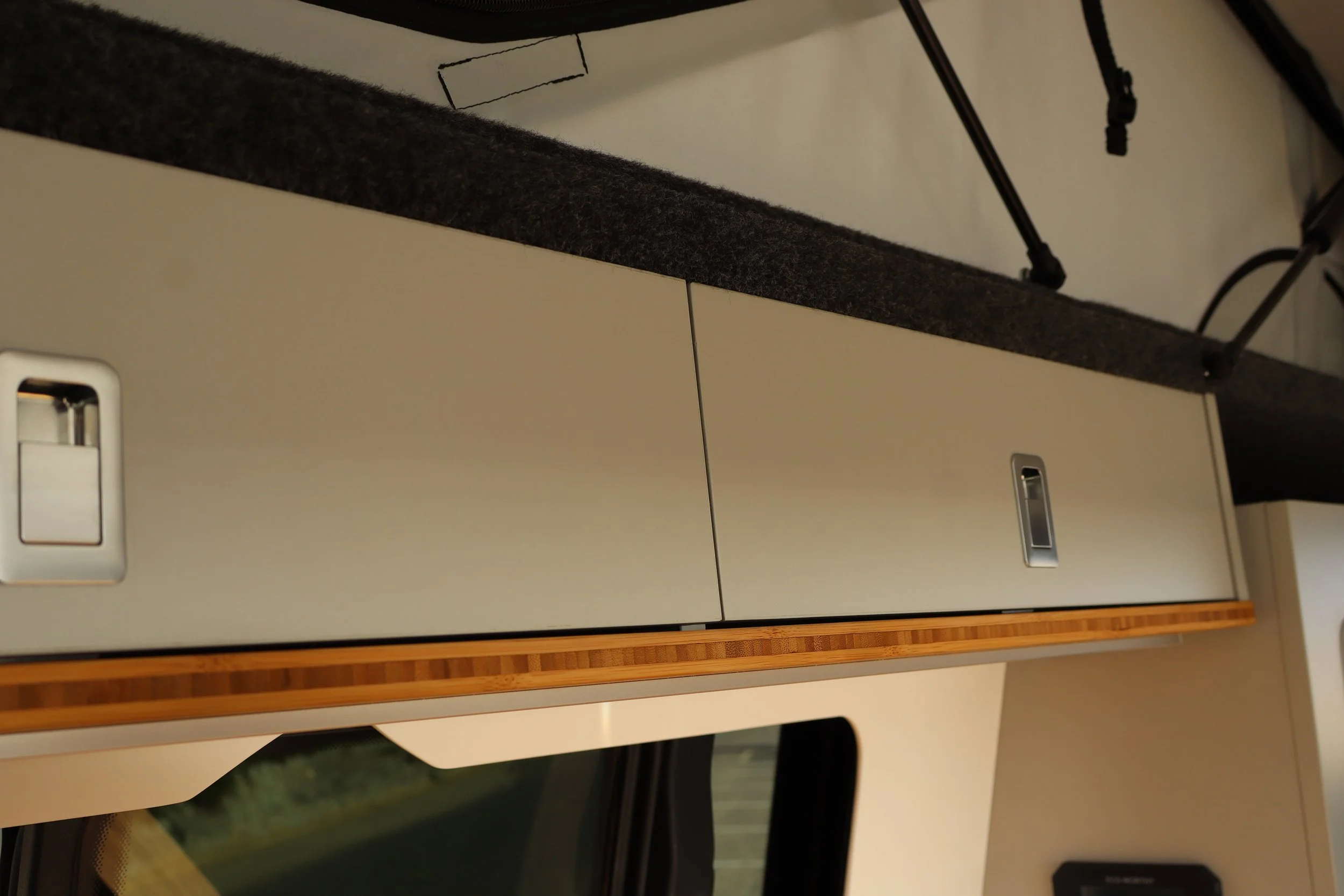 spacious overhead locker for organising cups