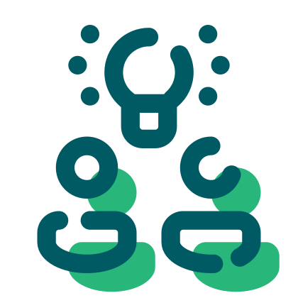 A person wearing glasses and a black hoodie using a computer.