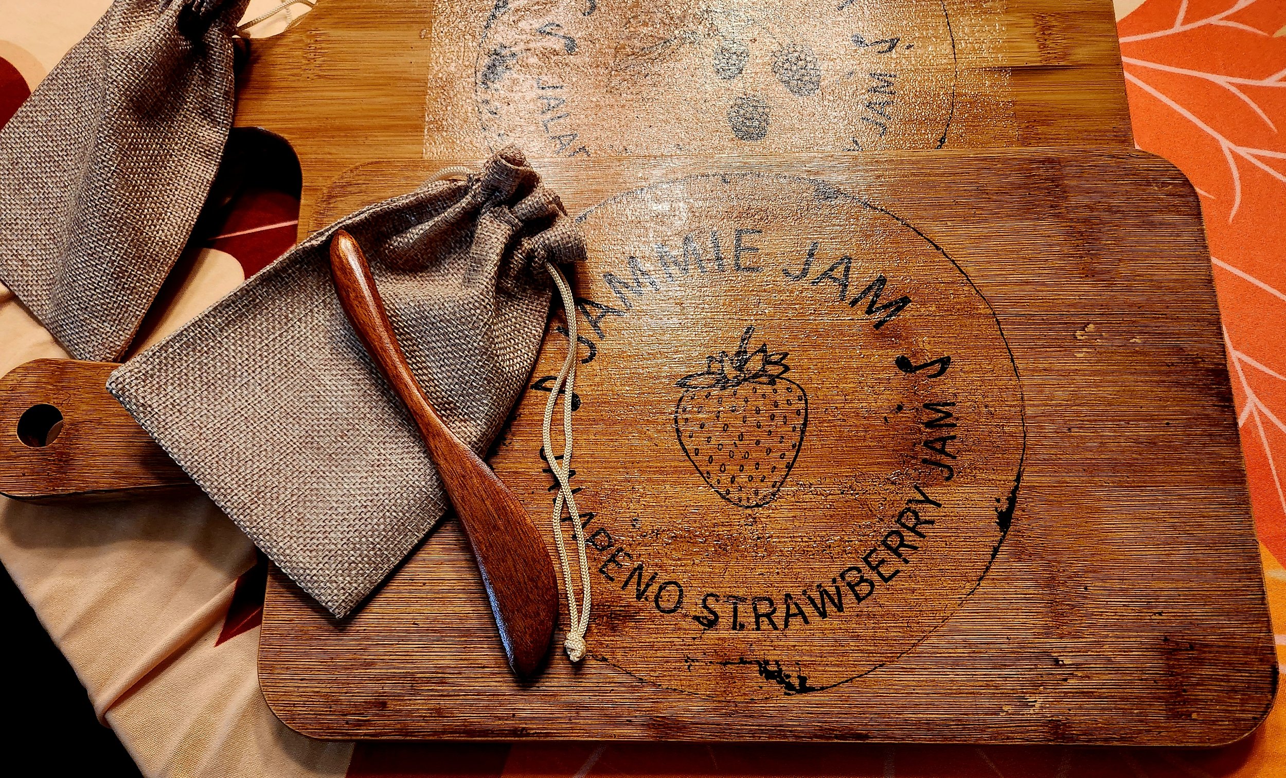 Jammie Jam Charcutier Board with cheese spreader.