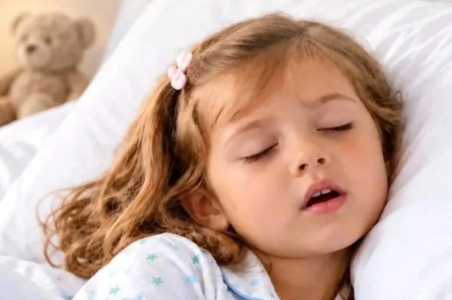 A child is mouth breathing while asleep