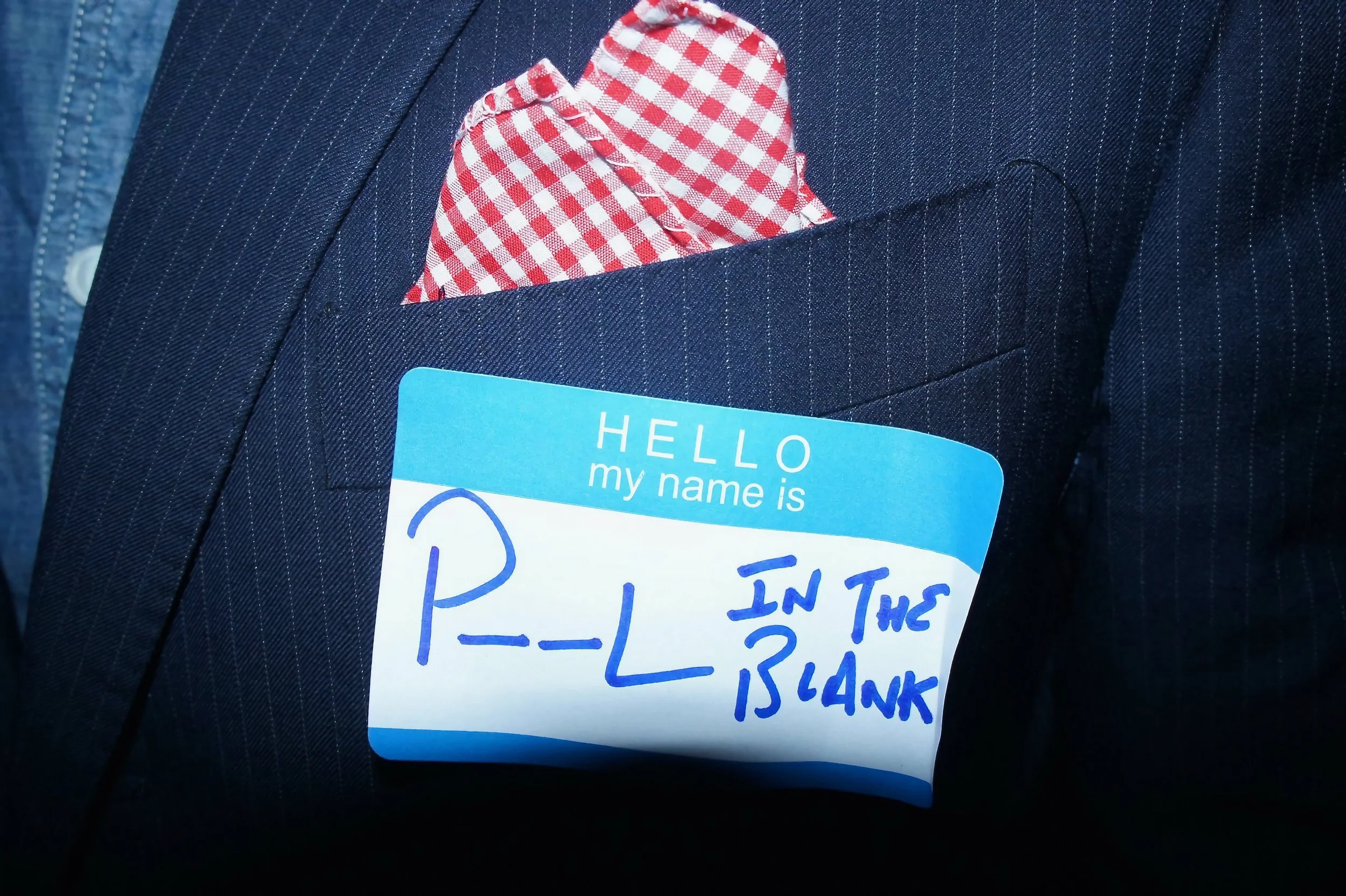 Funny name badge P--L in the blank
