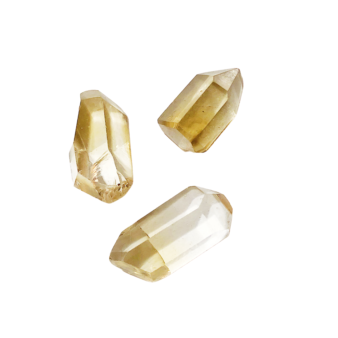 a trio of natural citrine points
