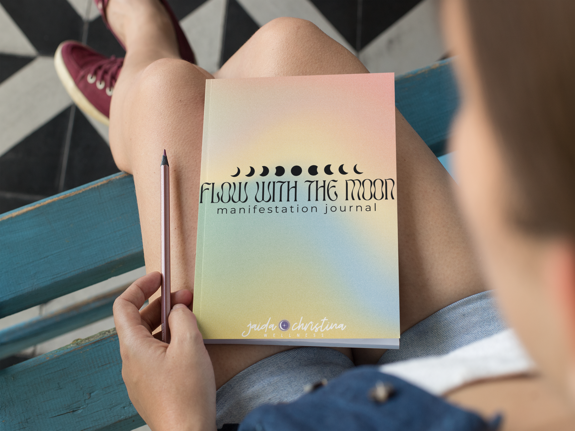 mockup-of-a-woman-with-an-a5-notebook-over-her-lap-29958.png