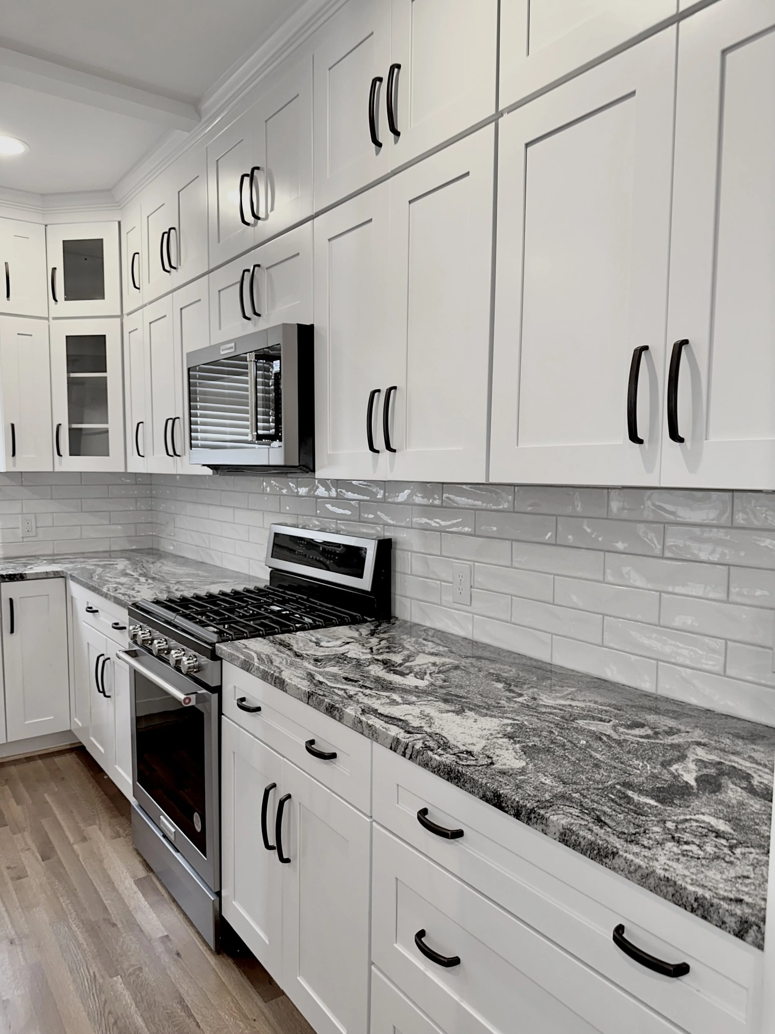 Finished stone island and perimeter countertops