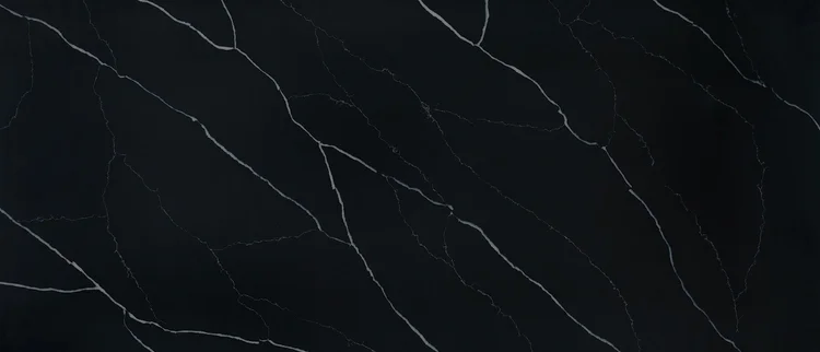 Marquina Midnight quartz product image with a black background and contrasting white veins