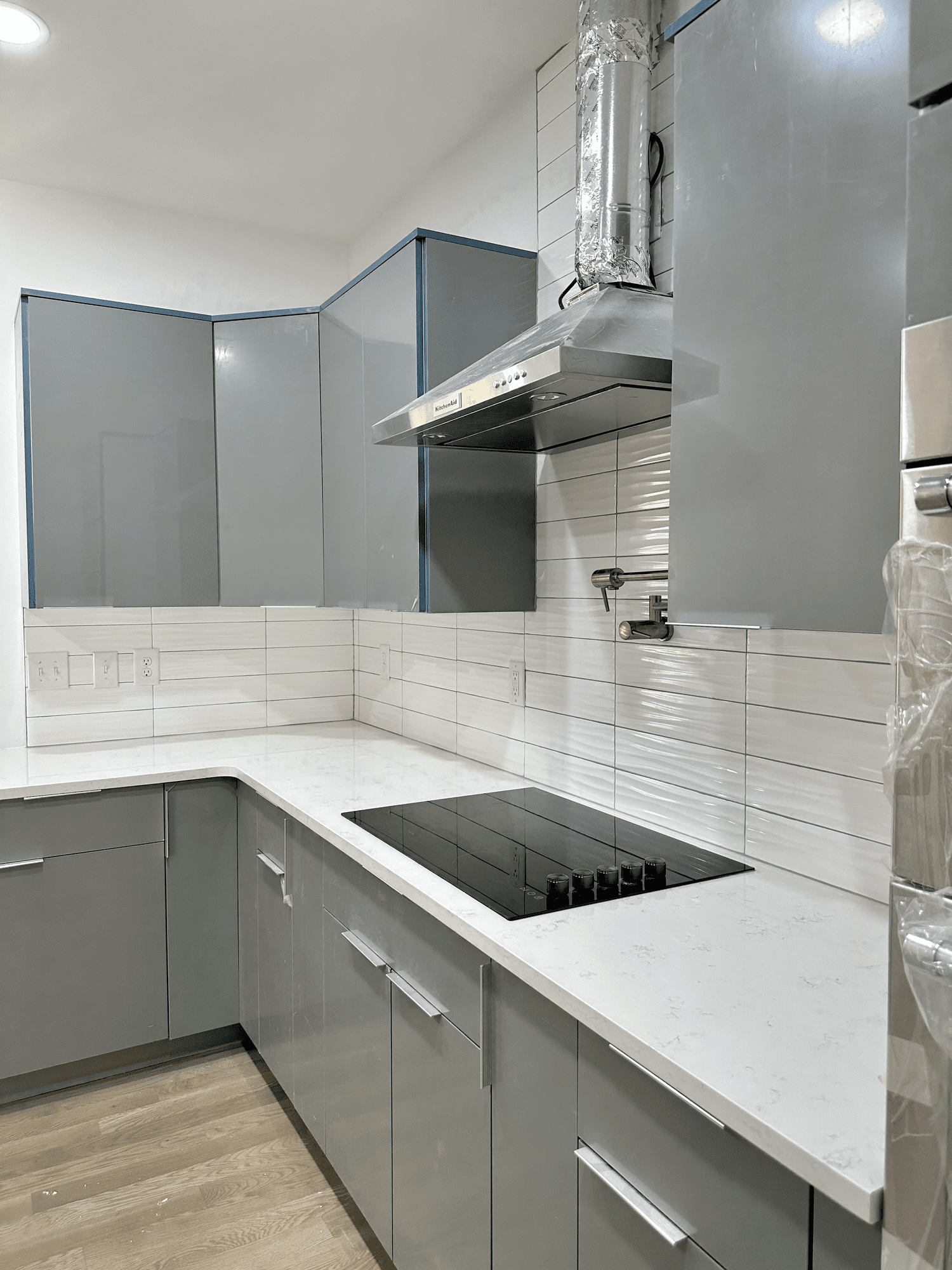 Sondos Stone countertop installation showing a completed kitchen layout
