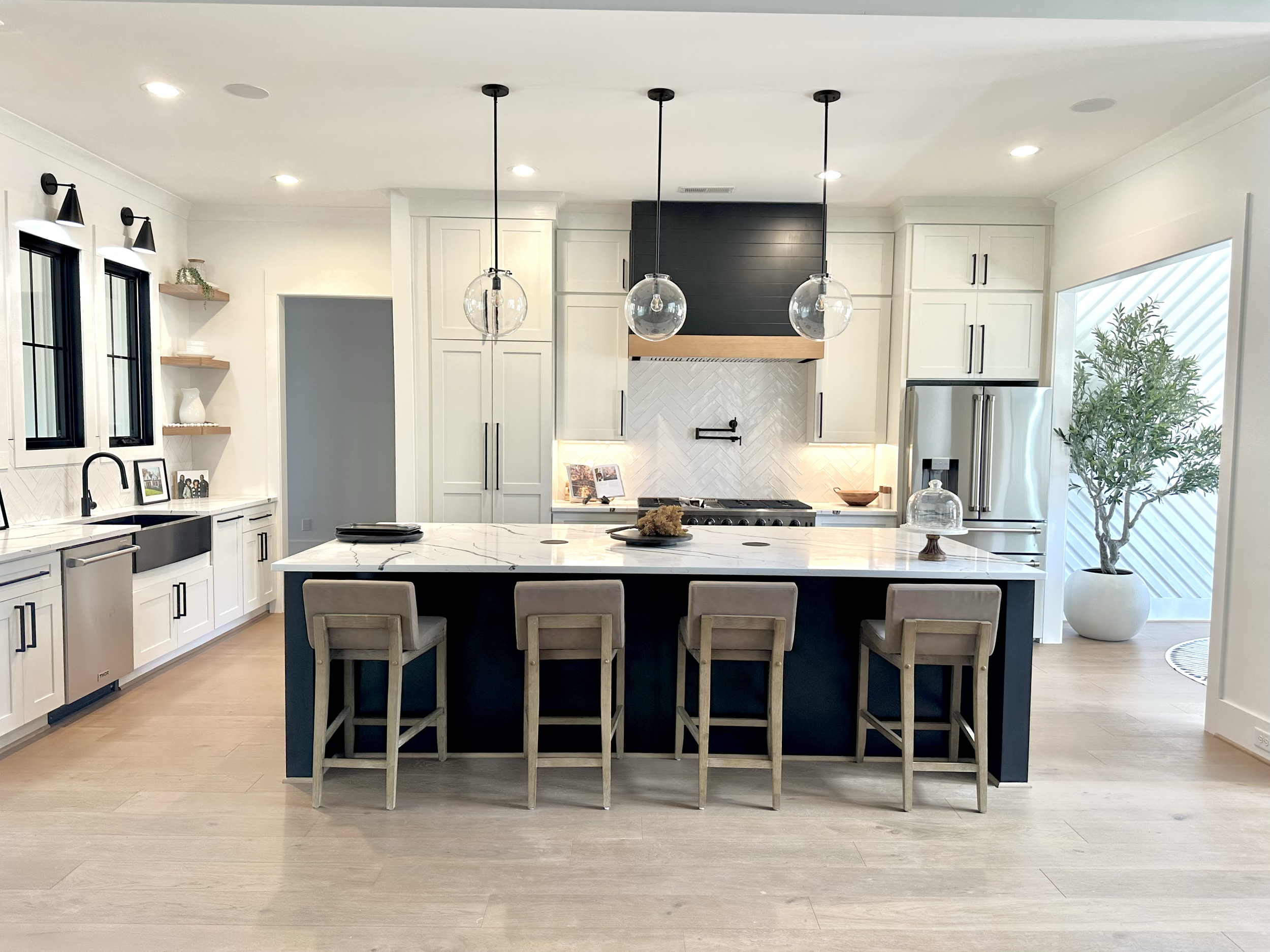 Completed Sondos Stone kitchen with a large statement island