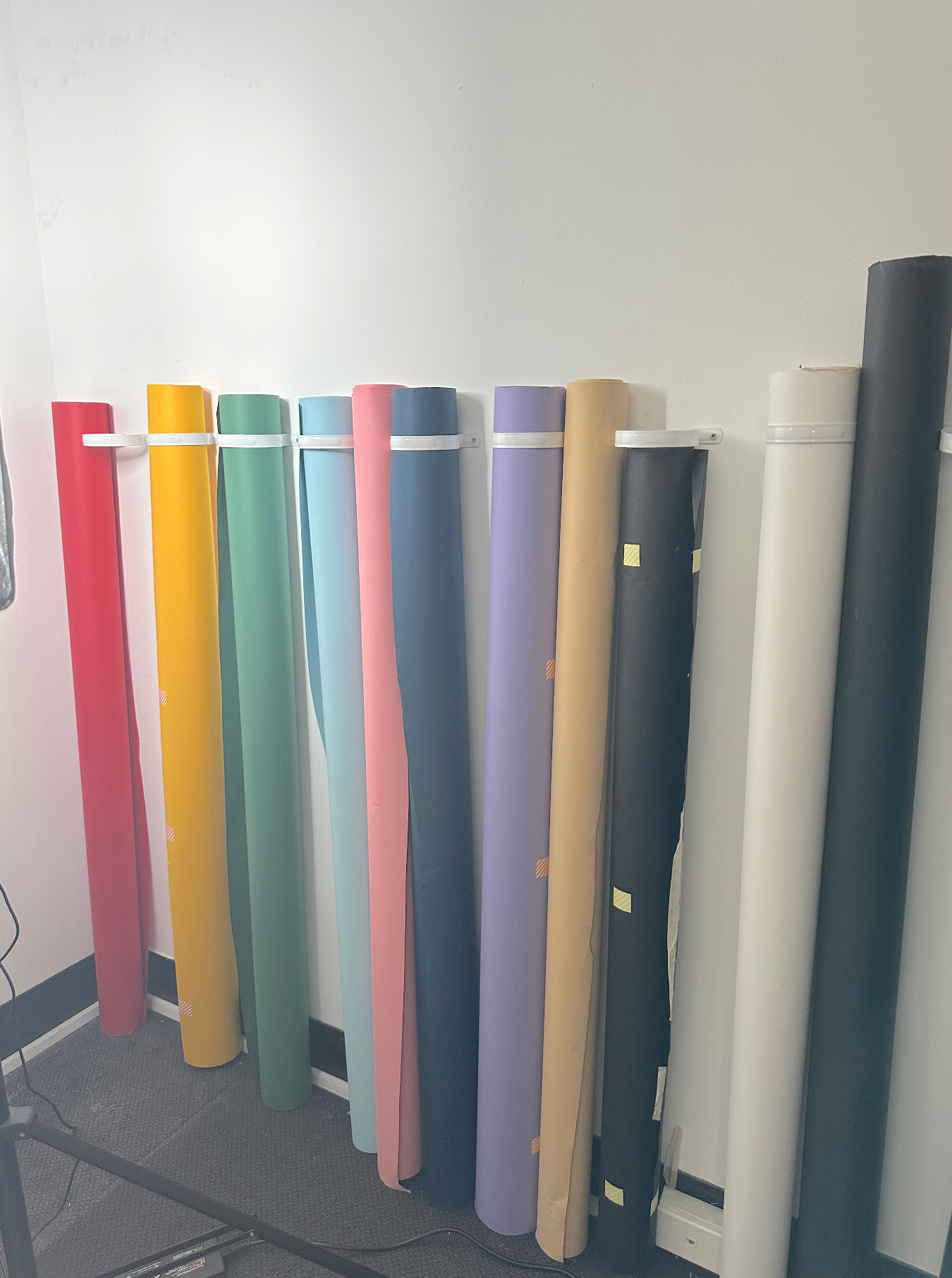 A selection of colourful backdrops used for portrait work at Folkstone's CBD studio