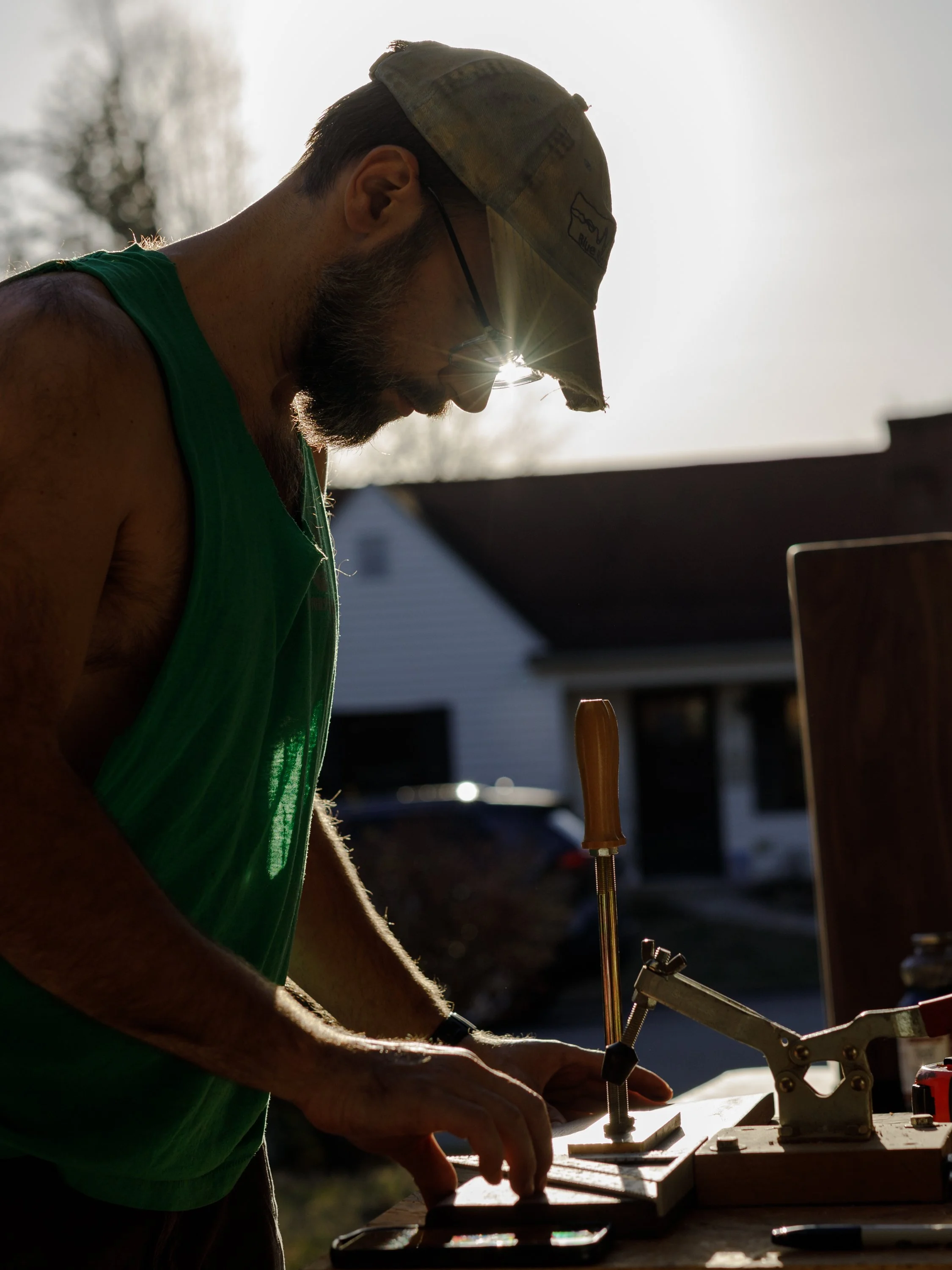 Nick working outside at a carpentry workbench