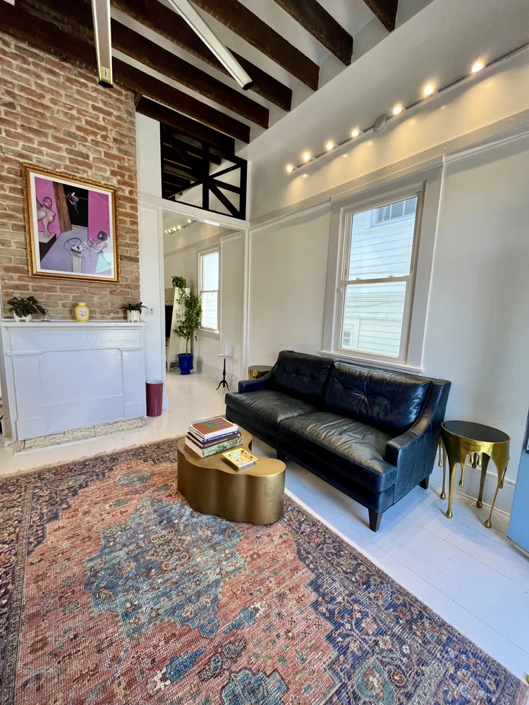 Lounge with black leather couch