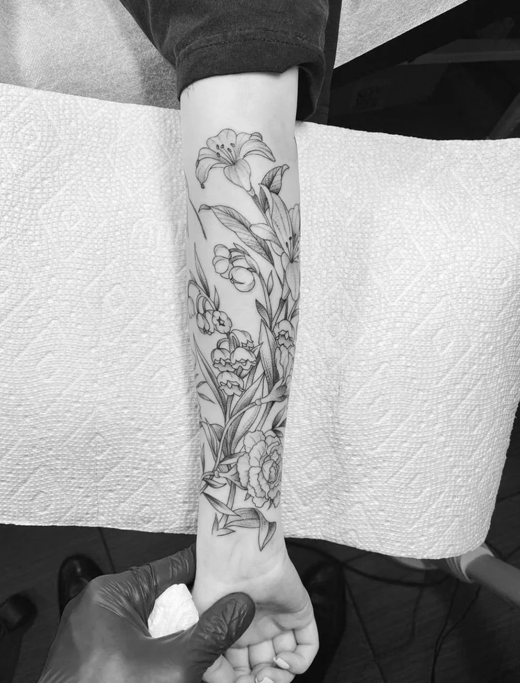 Floral fine-line tattoo