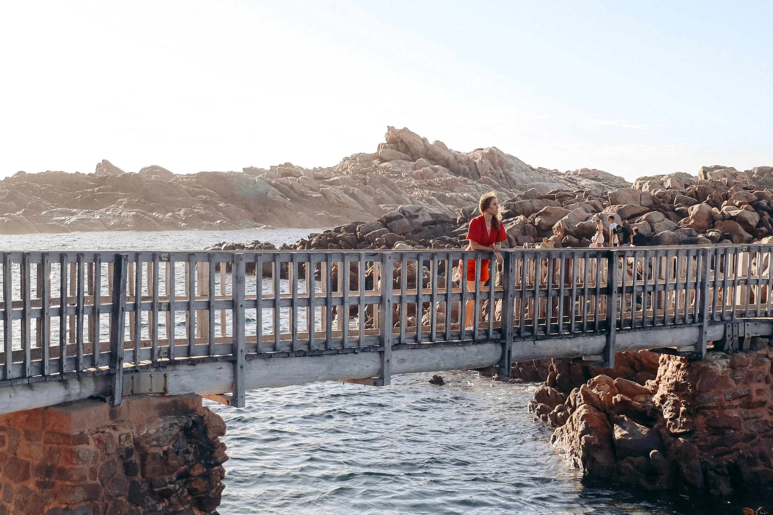 Standing on a bridge surrounded by dramatic rocks in Western Australia