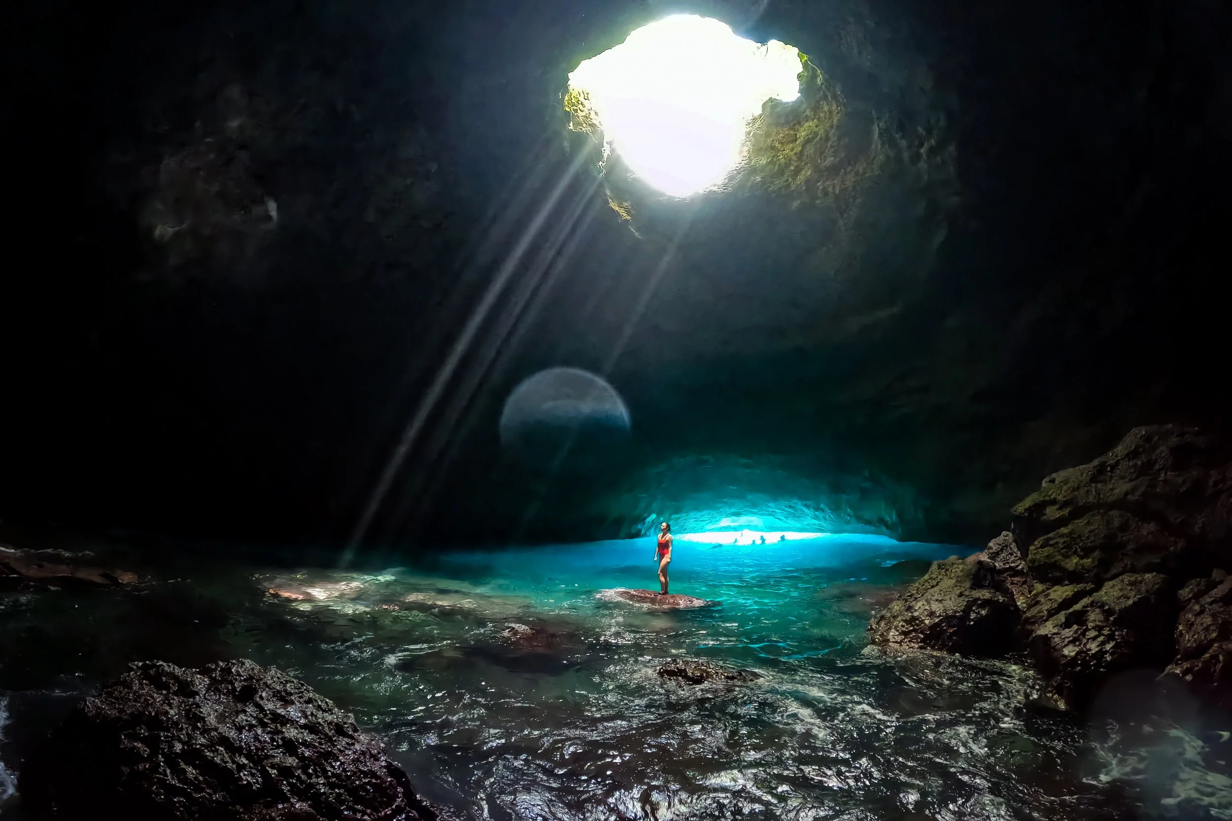 Standing in Blue Cave on Tanna Island in Vanuatu