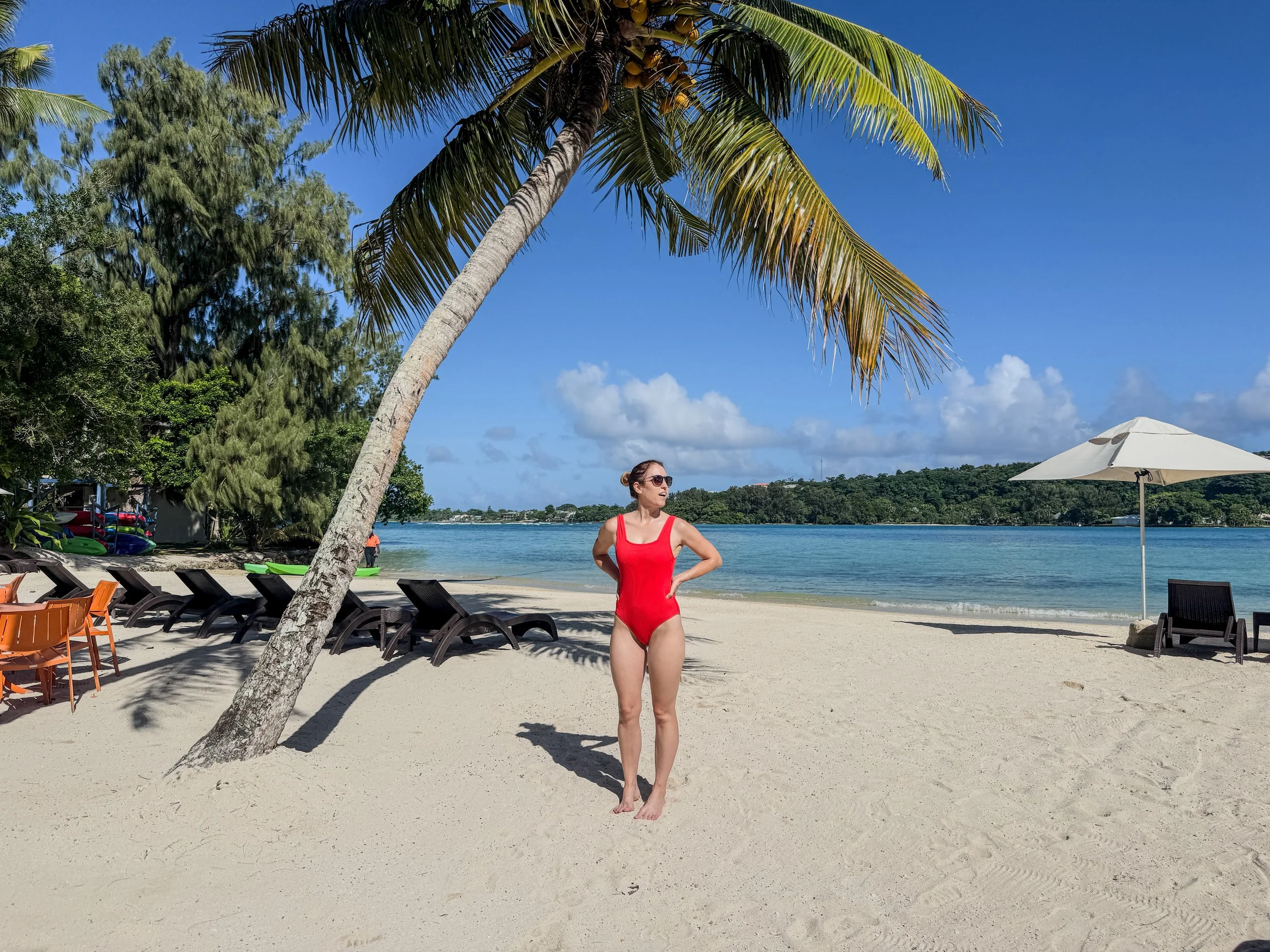 Standing on the beach on Erakor Island, one of the best day trips from Port Vila, Vanuatu