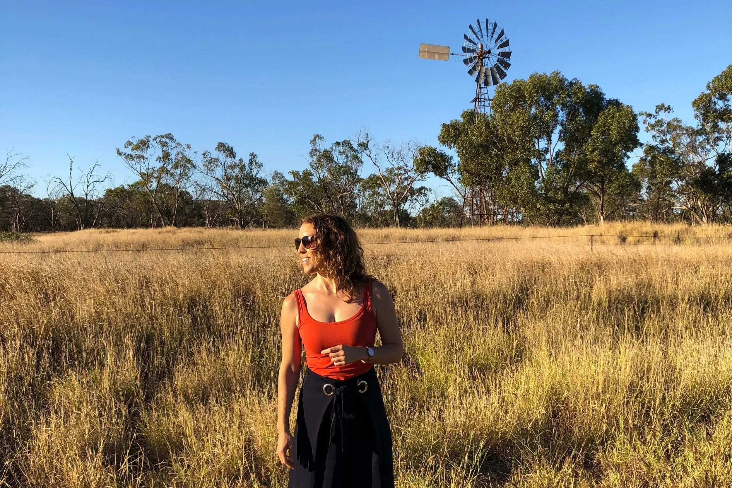 Standing in front of a windmill outside Charleville in outback Queensland